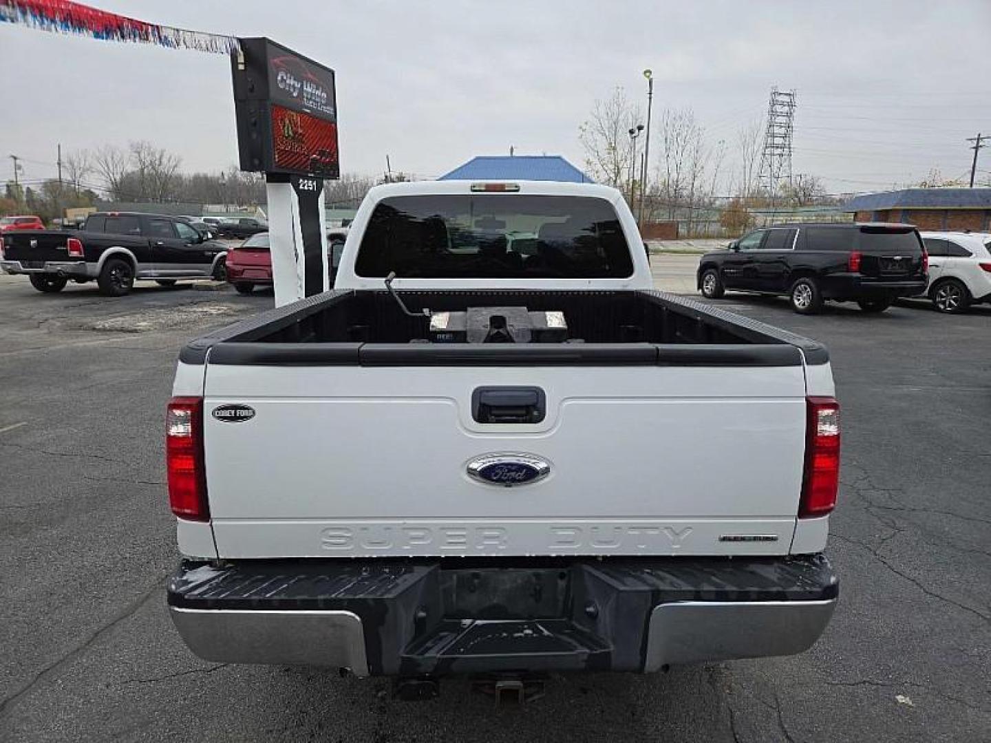 2014 WHITE /GREY Ford F-250 SD XLT SuperCab Long Bed 4WD (1FT7X2B69EE) with an 6.2L V8 OHV 16V engine, 6-Speed Automatic transmission, located at 3304 Woodville Road, Northwood, OH, 43619, (419) 210-8019, 41.612694, -83.480743 - Your #1 Destination for Auto Loans and mdash;No Matter Your Credit!At our dealership, we cater to everyone and mdash;whether you have good, bad, or no credit. With hundreds of vehicles to choose from, you can easily find the perfect car, truck, or SUV that fits your needs.Get Approved Today!Visit ou - Photo#3