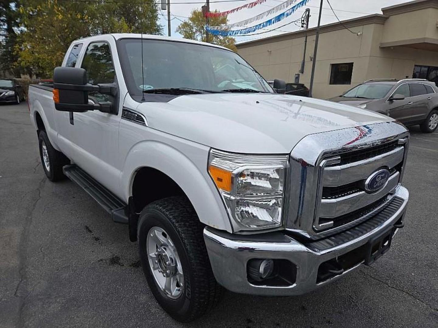 2014 WHITE /GREY Ford F-250 SD XLT SuperCab Long Bed 4WD (1FT7X2B69EE) with an 6.2L V8 OHV 16V engine, 6-Speed Automatic transmission, located at 3304 Woodville Road, Northwood, OH, 43619, (419) 210-8019, 41.612694, -83.480743 - Your #1 Destination for Auto Loans and mdash;No Matter Your Credit!At our dealership, we cater to everyone and mdash;whether you have good, bad, or no credit. With hundreds of vehicles to choose from, you can easily find the perfect car, truck, or SUV that fits your needs.Get Approved Today!Visit ou - Photo#6