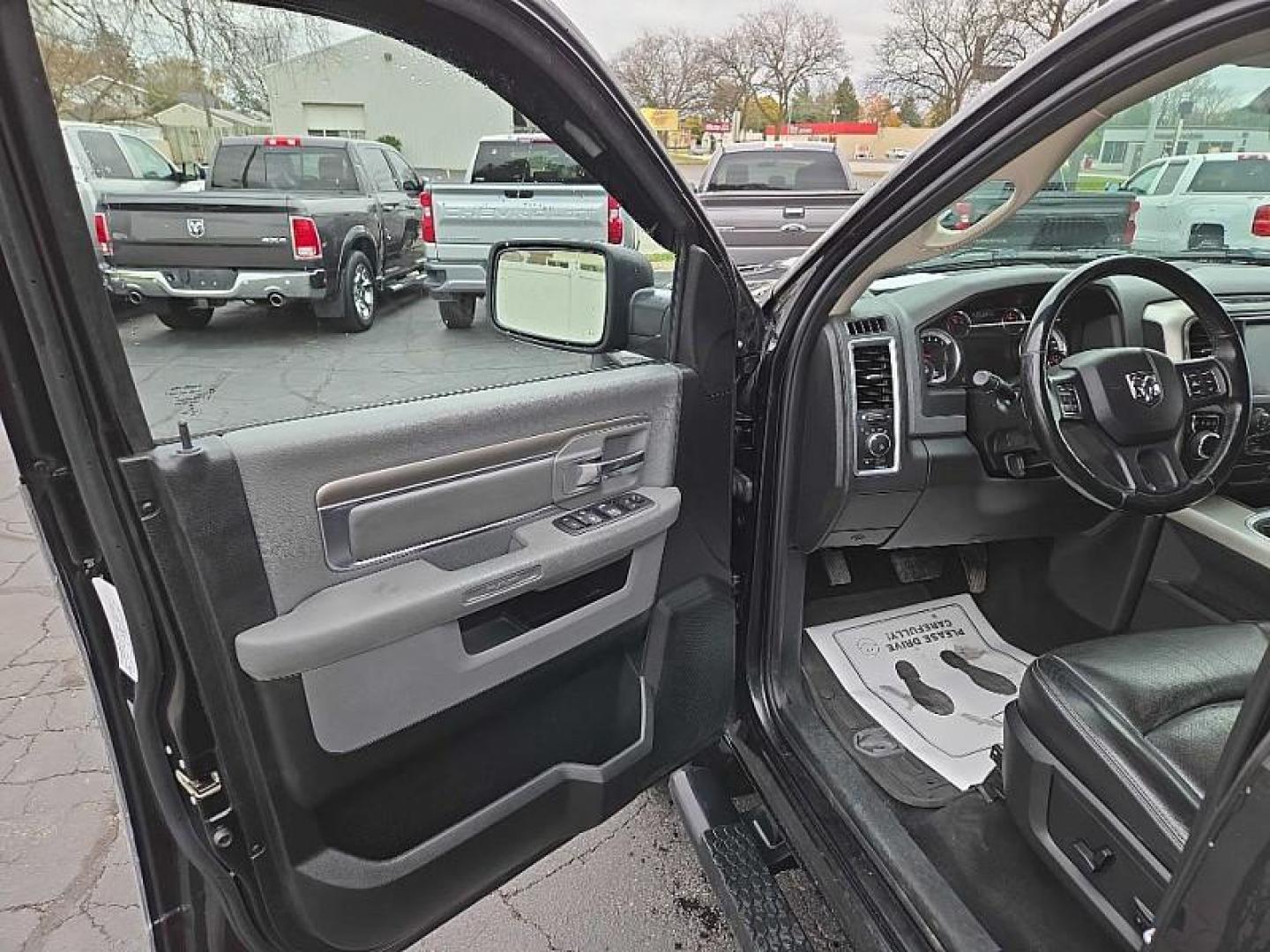 2018 BLACK /BLACK RAM 1500 SLT Crew Cab LWB 4WD (1C6RR7TMXJS) with an 3.0L V6 DOHC 24V DIESEL engine, 8A transmission, located at 3304 Woodville Road, Northwood, OH, 43619, (419) 210-8019, 41.612694, -83.480743 - Your #1 Destination for Auto Loans and mdash;No Matter Your Credit!At our dealership, we cater to everyone and mdash;whether you have good, bad, or no credit. With hundreds of vehicles to choose from, you can easily find the perfect car, truck, or SUV that fits your needs.Get Approved Today!Visit ou - Photo#6