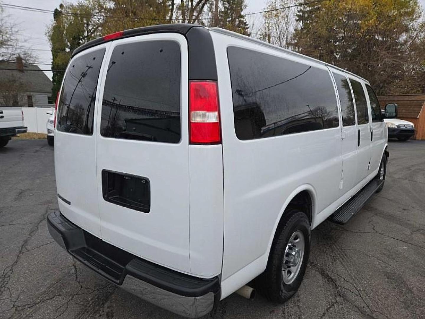 2017 WHITE /TAN Chevrolet Express LT 3500 Extended (1GAZGPFG7H1) with an 6.0L V8 OHV 16V FFV engine, 6A transmission, located at 3304 Woodville Road, Northwood, OH, 43619, (419) 210-8019, 41.612694, -83.480743 - Your #1 Destination for Auto Loans and mdash;No Matter Your Credit!At our dealership, we believe everyone deserves the opportunity to drive their dream car and mdash;whether you have good credit, bad credit, or no credit at all. With a wide selection of hundreds of cars, trucks, and SUVs, you'll fin - Photo#4