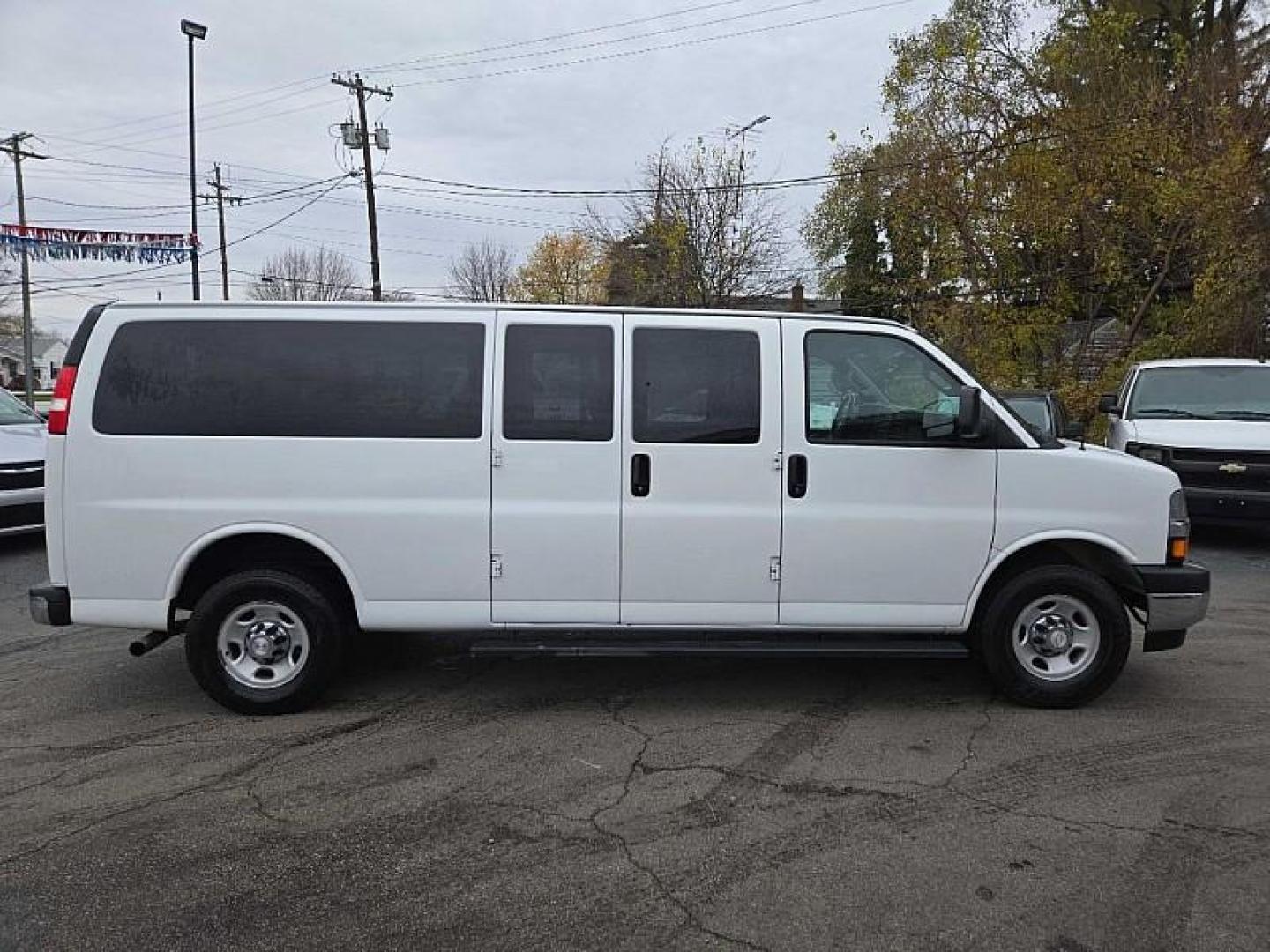 2017 WHITE /TAN Chevrolet Express LT 3500 Extended (1GAZGPFG7H1) with an 6.0L V8 OHV 16V FFV engine, 6A transmission, located at 3304 Woodville Road, Northwood, OH, 43619, (419) 210-8019, 41.612694, -83.480743 - Your #1 Destination for Auto Loans and mdash;No Matter Your Credit!At our dealership, we believe everyone deserves the opportunity to drive their dream car and mdash;whether you have good credit, bad credit, or no credit at all. With a wide selection of hundreds of cars, trucks, and SUVs, you'll fin - Photo#5