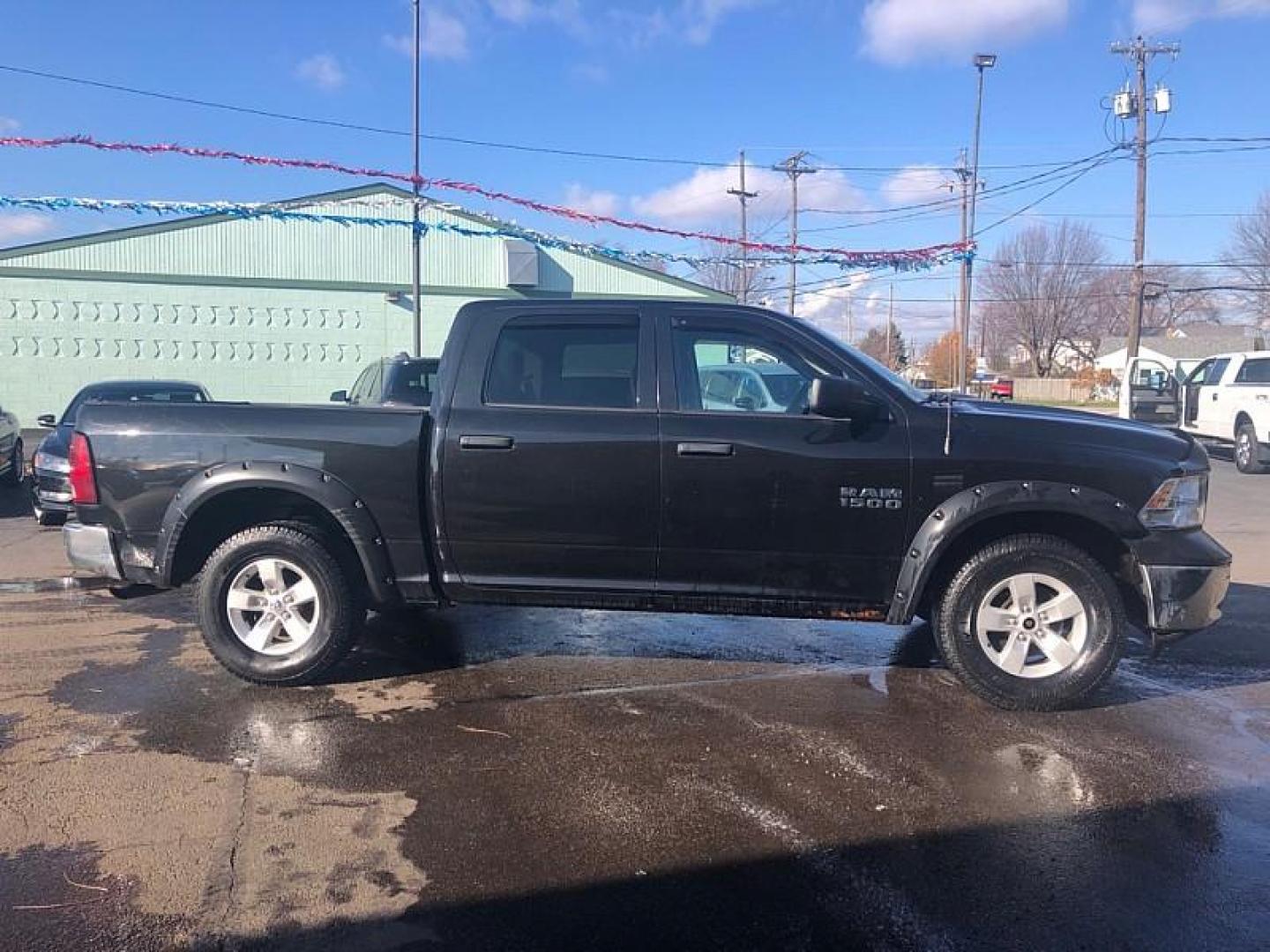 2015 BLACK /GREY RAM 1500 Tradesman Crew Cab SWB 4WD (3C6RR7KT3FG) with an 5.7L V8 OHV 16V engine, 6-Speed Automatic transmission, located at 3304 Woodville Road, Northwood, OH, 43619, (419) 210-8019, 41.612694, -83.480743 - Your #1 Destination for Auto Loans and mdash;No Matter Your Credit!At our dealership, we believe everyone deserves the opportunity to drive their dream car and mdash;whether you have good credit, bad credit, or no credit at all. With a wide selection of hundreds of cars, trucks, and SUVs, you'll fin - Photo#5