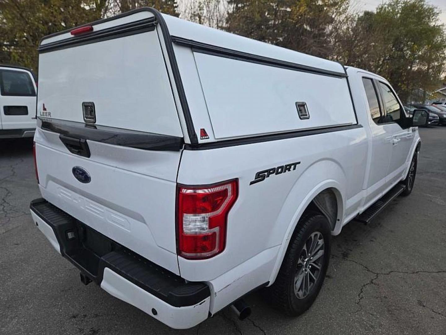 2019 WHITE /GREY Ford F-150 XL SuperCab 8-ft. 2WD (1FTEX1C47KK) with an 3.5L V6 DOHC 24V engine, 6A transmission, located at 3304 Woodville Road, Northwood, OH, 43619, (419) 210-8019, 41.612694, -83.480743 - Your #1 Destination for Auto Loans and mdash;No Matter Your Credit!At our dealership, we believe everyone deserves the opportunity to drive their dream car and mdash;whether you have good credit, bad credit, or no credit at all. With a wide selection of hundreds of cars, trucks, and SUVs, you'll fin - Photo#4