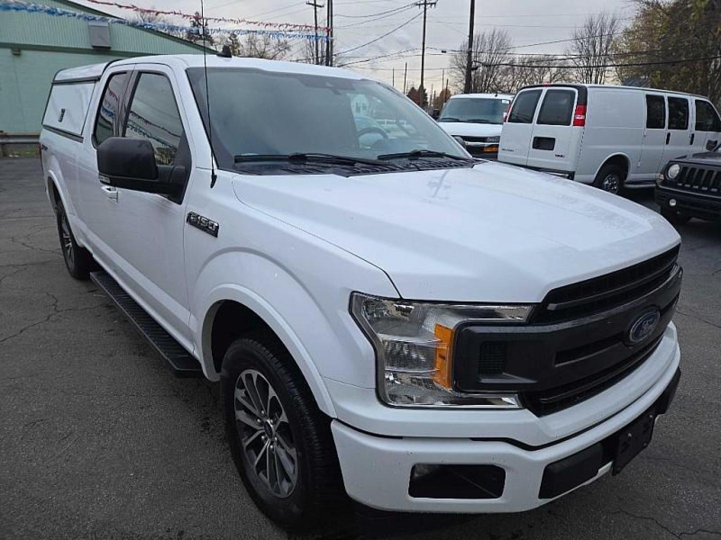 2019 WHITE /GREY Ford F-150 XL SuperCab 8-ft. 2WD (1FTEX1C47KK) with an 3.5L V6 DOHC 24V engine, 6A transmission, located at 3304 Woodville Road, Northwood, OH, 43619, (419) 210-8019, 41.612694, -83.480743 - Your #1 Destination for Auto Loans and mdash;No Matter Your Credit!At our dealership, we believe everyone deserves the opportunity to drive their dream car and mdash;whether you have good credit, bad credit, or no credit at all. With a wide selection of hundreds of cars, trucks, and SUVs, you'll fin - Photo#6