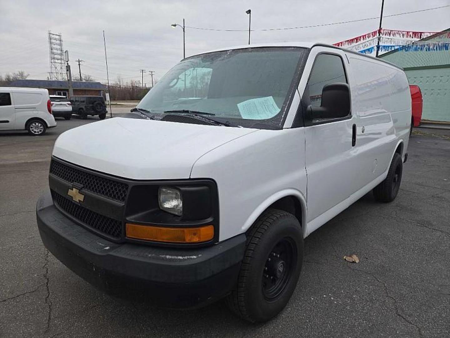 2015 WHITE /GRAY Chevrolet Express 2500 Cargo FFV (1GCWGFCF8F1) with an 4.8L V8 FFV engine, 6-Speed Automatic transmission, located at 3304 Woodville Road, Northwood, OH, 43619, (419) 210-8019, 41.612694, -83.480743 - Your #1 Destination for Auto Loans and mdash;No Matter Your Credit!At our dealership, we believe everyone deserves the opportunity to drive their dream car and mdash;whether you have good credit, bad credit, or no credit at all. With a wide selection of hundreds of cars, trucks, and SUVs, you'll fin - Photo#0