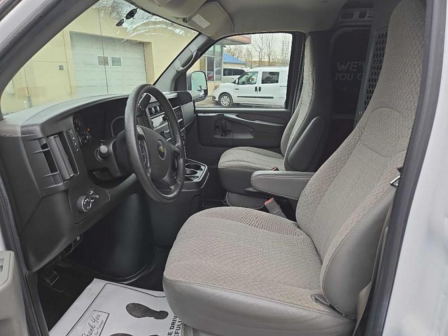 2015 WHITE /GRAY Chevrolet Express 2500 Cargo FFV (1GCWGFCF8F1) with an 4.8L V8 FFV engine, 6-Speed Automatic transmission, located at 3304 Woodville Road, Northwood, OH, 43619, (419) 210-8019, 41.612694, -83.480743 - Your #1 Destination for Auto Loans and mdash;No Matter Your Credit!At our dealership, we believe everyone deserves the opportunity to drive their dream car and mdash;whether you have good credit, bad credit, or no credit at all. With a wide selection of hundreds of cars, trucks, and SUVs, you'll fin - Photo#9