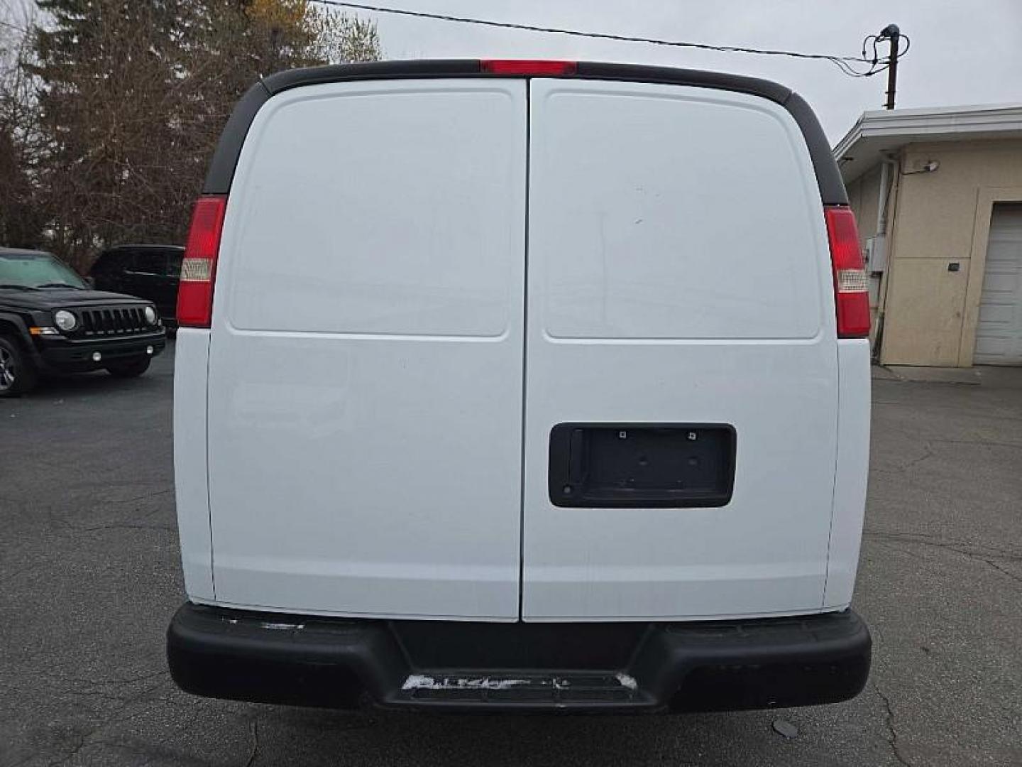 2015 WHITE /GRAY Chevrolet Express 2500 Cargo FFV (1GCWGFCF8F1) with an 4.8L V8 FFV engine, 6-Speed Automatic transmission, located at 3304 Woodville Road, Northwood, OH, 43619, (419) 210-8019, 41.612694, -83.480743 - Your #1 Destination for Auto Loans and mdash;No Matter Your Credit!At our dealership, we believe everyone deserves the opportunity to drive their dream car and mdash;whether you have good credit, bad credit, or no credit at all. With a wide selection of hundreds of cars, trucks, and SUVs, you'll fin - Photo#3