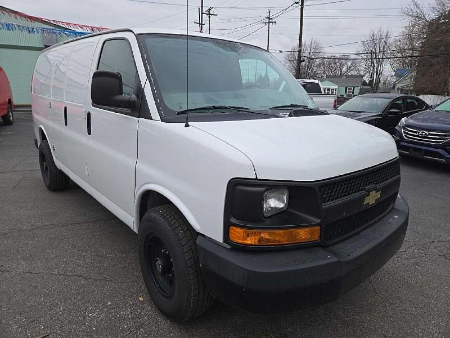 2015 WHITE /GRAY Chevrolet Express 2500 Cargo FFV (1GCWGFCF8F1) with an 4.8L V8 FFV engine, 6-Speed Automatic transmission, located at 3304 Woodville Road, Northwood, OH, 43619, (419) 210-8019, 41.612694, -83.480743 - Your #1 Destination for Auto Loans and mdash;No Matter Your Credit!At our dealership, we believe everyone deserves the opportunity to drive their dream car and mdash;whether you have good credit, bad credit, or no credit at all. With a wide selection of hundreds of cars, trucks, and SUVs, you'll fin - Photo#6