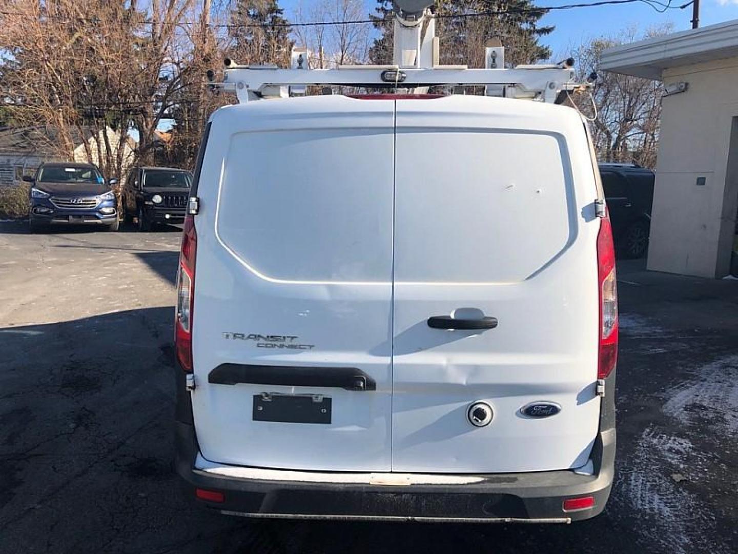 2016 WHITE /GREY Ford Transit Connect Cargo Van XL LWB w/Rear Liftgate (NM0LS7E73G1) with an 2.5L L4 DOHC 16V engine, 6A transmission, located at 3304 Woodville Road, Northwood, OH, 43619, (419) 210-8019, 41.612694, -83.480743 - Your #1 Destination for Auto Loans and mdash;No Matter Your Credit!At our dealership, we believe everyone deserves the opportunity to drive their dream car and mdash;whether you have good credit, bad credit, or no credit at all. With a wide selection of hundreds of cars, trucks, and SUVs, you'll fin - Photo#3