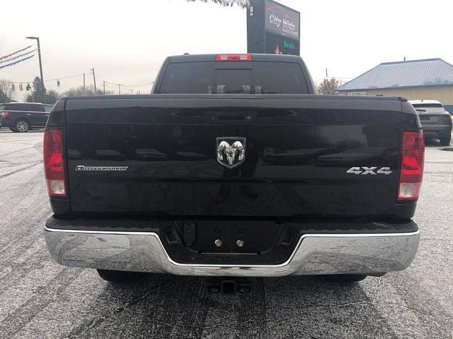 2018 BLACK /GREY RAM 1500 SLT Crew Cab LWB 4WD (1C6RR7TM3JS) with an 3.0L V6 DOHC 24V DIESEL engine, 8A transmission, located at 3304 Woodville Road, Northwood, OH, 43619, (419) 210-8019, 41.612694, -83.480743 - Your #1 Destination for Auto Loans and mdash;No Matter Your Credit!At our dealership, we believe everyone deserves the opportunity to drive their dream car and mdash;whether you have good credit, bad credit, or no credit at all. With a wide selection of hundreds of cars, trucks, and SUVs, you'll fin - Photo#3