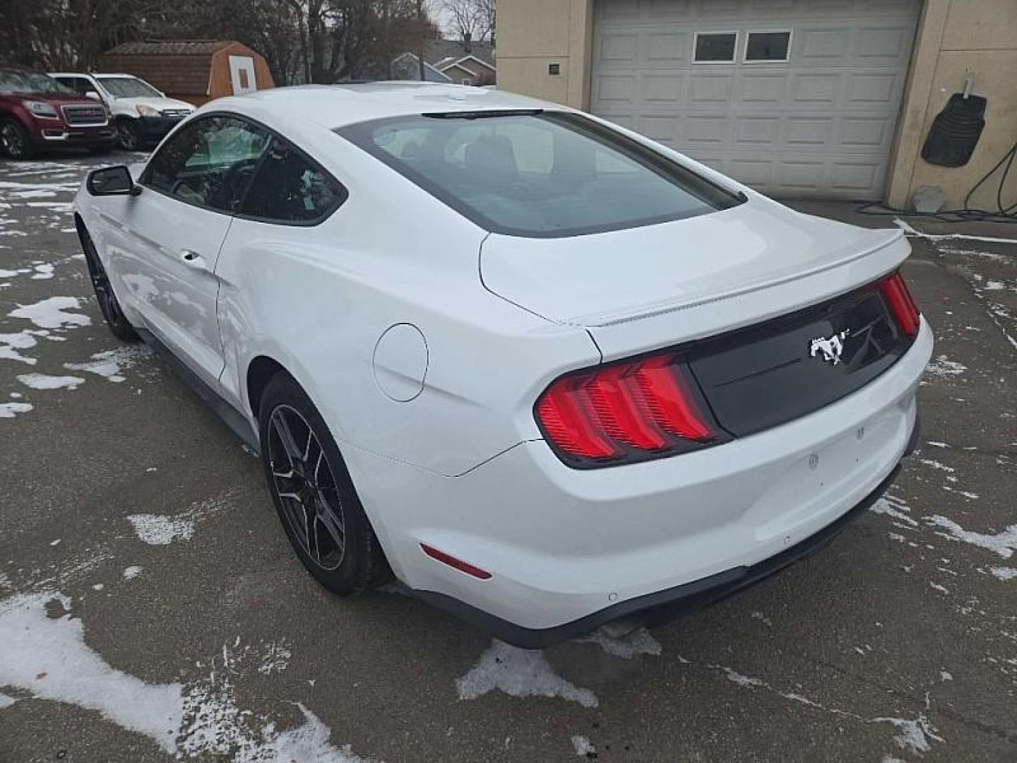 2018 WHITE /BLACK Ford Mustang EcoBoost Coupe (1FA6P8TH4J5) with an 2.3L L4 DOHC 16V engine, Auto 10-Spd SelectShft transmission, located at 3304 Woodville Road, Northwood, OH, 43619, (419) 210-8019, 41.612694, -83.480743 - Your #1 Destination for Auto Loans and mdash;No Matter Your Credit!At our dealership, we believe everyone deserves the opportunity to drive their dream car and mdash;whether you have good credit, bad credit, or no credit at all. With a wide selection of hundreds of cars, trucks, and SUVs, you'll fin - Photo#2