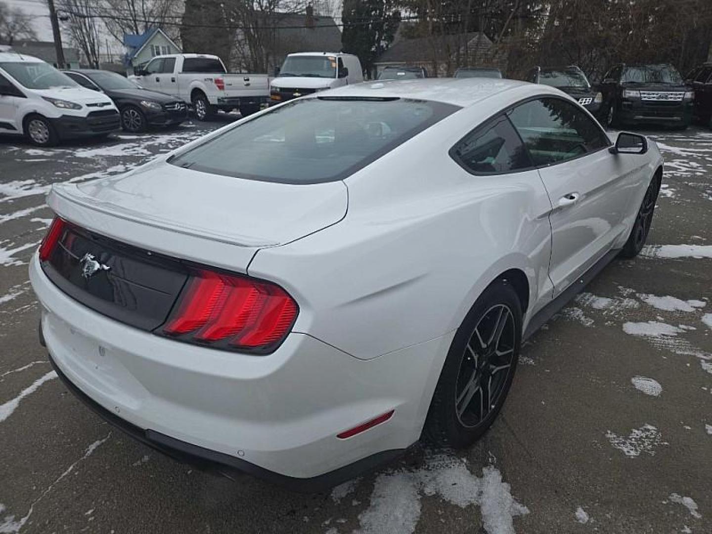 2018 WHITE /BLACK Ford Mustang EcoBoost Coupe (1FA6P8TH4J5) with an 2.3L L4 DOHC 16V engine, Auto 10-Spd SelectShft transmission, located at 3304 Woodville Road, Northwood, OH, 43619, (419) 210-8019, 41.612694, -83.480743 - Your #1 Destination for Auto Loans and mdash;No Matter Your Credit!At our dealership, we believe everyone deserves the opportunity to drive their dream car and mdash;whether you have good credit, bad credit, or no credit at all. With a wide selection of hundreds of cars, trucks, and SUVs, you'll fin - Photo#4