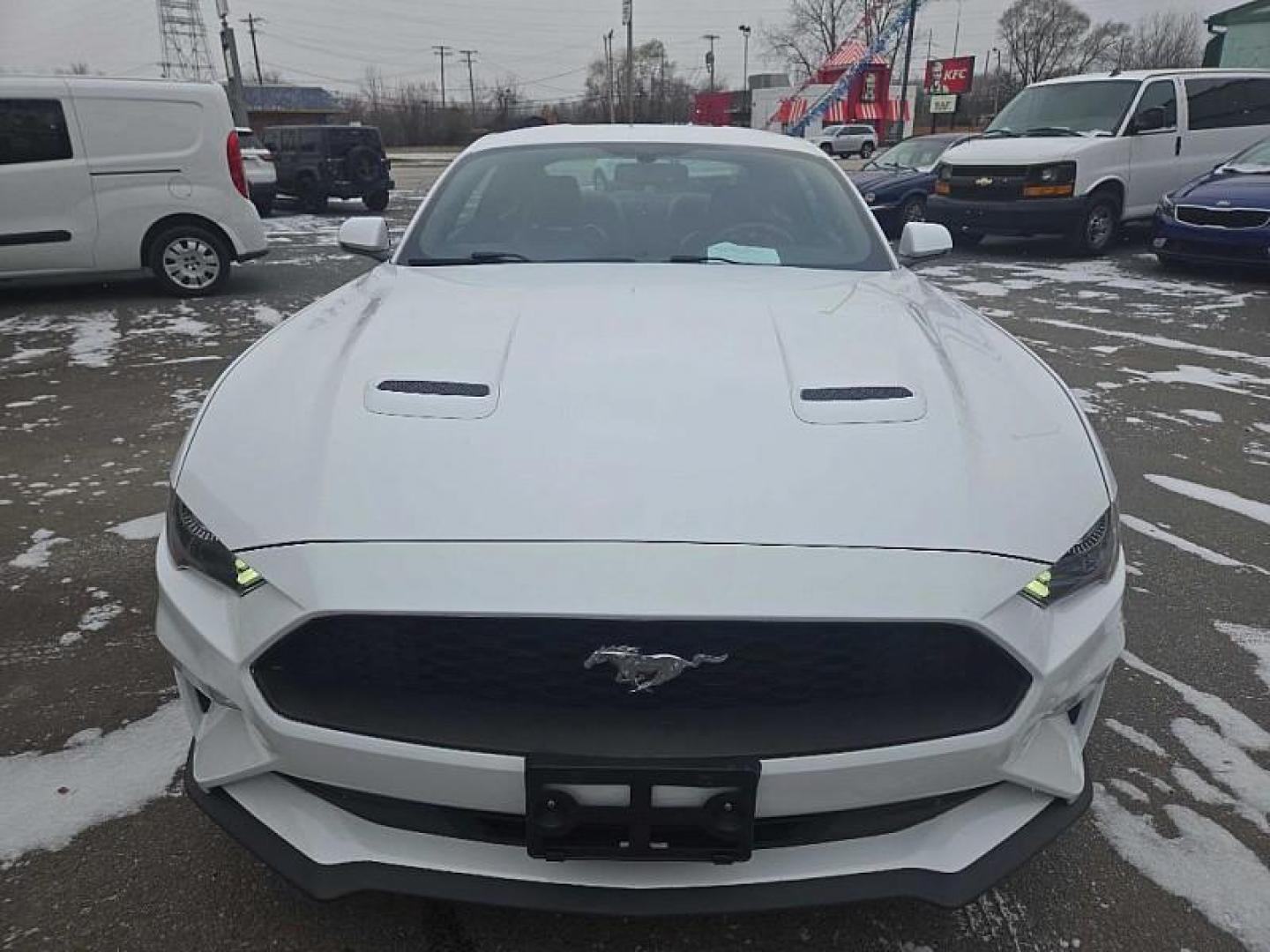 2018 WHITE /BLACK Ford Mustang EcoBoost Coupe (1FA6P8TH4J5) with an 2.3L L4 DOHC 16V engine, Auto 10-Spd SelectShft transmission, located at 3304 Woodville Road, Northwood, OH, 43619, (419) 210-8019, 41.612694, -83.480743 - Your #1 Destination for Auto Loans and mdash;No Matter Your Credit!At our dealership, we believe everyone deserves the opportunity to drive their dream car and mdash;whether you have good credit, bad credit, or no credit at all. With a wide selection of hundreds of cars, trucks, and SUVs, you'll fin - Photo#7