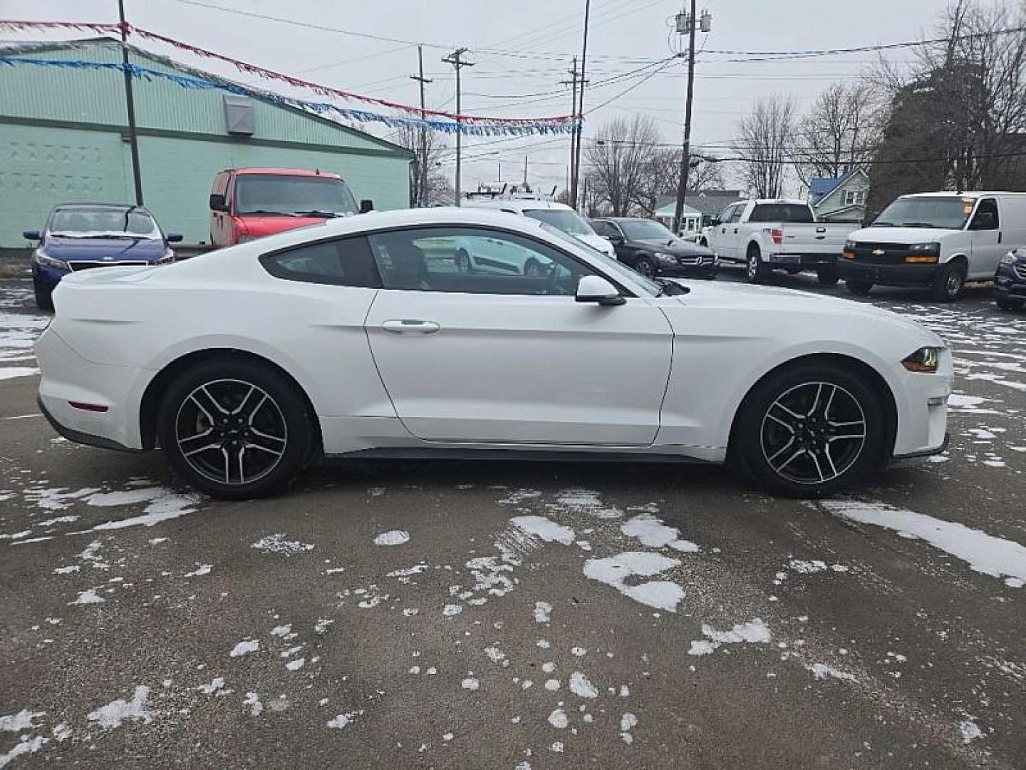 2018 WHITE /BLACK Ford Mustang EcoBoost Coupe (1FA6P8TH4J5) with an 2.3L L4 DOHC 16V engine, Auto 10-Spd SelectShft transmission, located at 3304 Woodville Road, Northwood, OH, 43619, (419) 210-8019, 41.612694, -83.480743 - Your #1 Destination for Auto Loans and mdash;No Matter Your Credit!At our dealership, we believe everyone deserves the opportunity to drive their dream car and mdash;whether you have good credit, bad credit, or no credit at all. With a wide selection of hundreds of cars, trucks, and SUVs, you'll fin - Photo#5