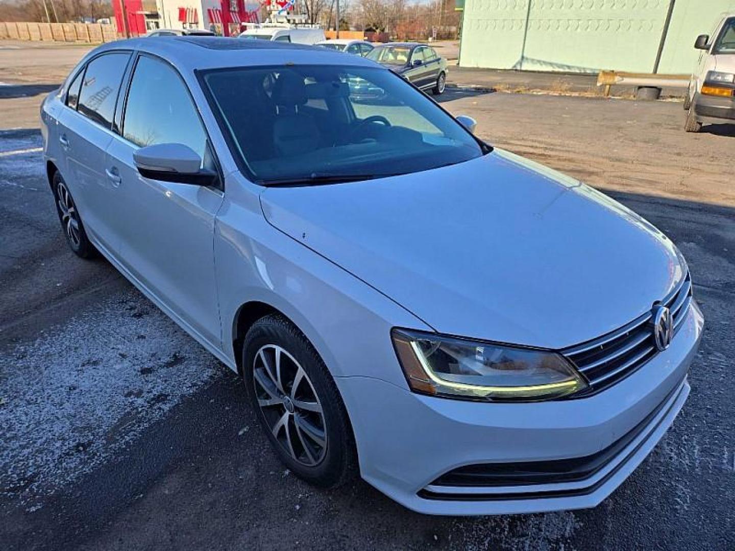 2018 WHITE /BLACK Volkswagen Jetta 1.4T SE 6A (3VWDB7AJ0JM) with an 1.4L L4 DOHC 20V engine, 6A transmission, located at 3304 Woodville Road, Northwood, OH, 43619, (419) 210-8019, 41.612694, -83.480743 - Your #1 Destination for Auto Loans and mdash;No Matter Your Credit!At our dealership, we believe everyone deserves the opportunity to drive their dream car and mdash;whether you have good credit, bad credit, or no credit at all. With a wide selection of hundreds of cars, trucks, and SUVs, you'll fin - Photo#6