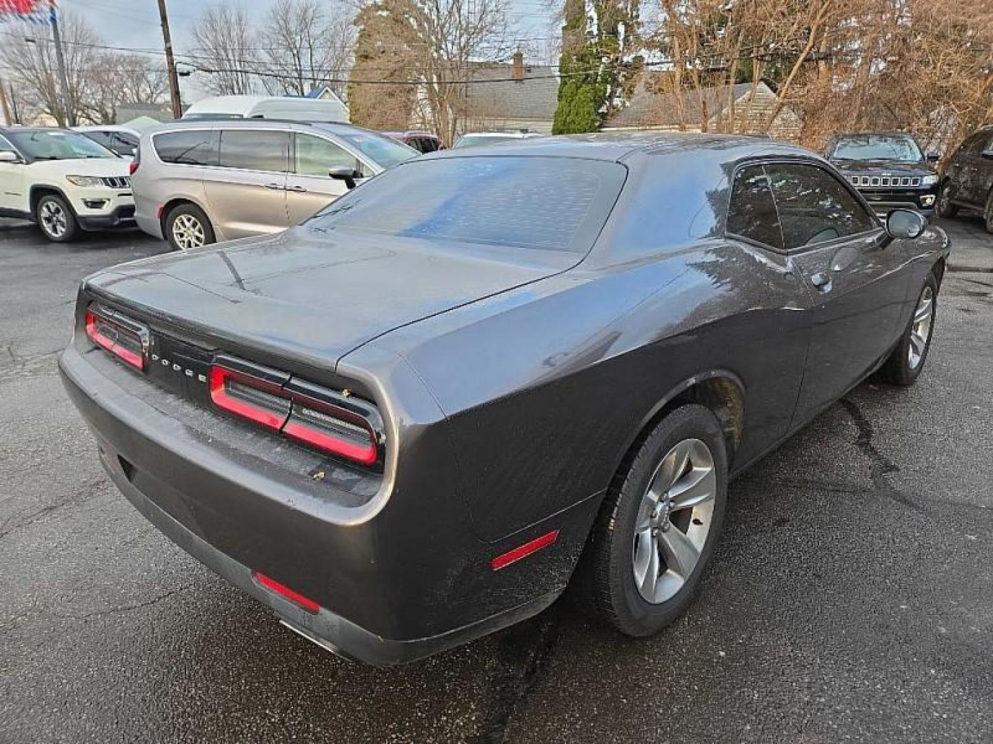 2017 MGRAY /BLACK Dodge Challenger SXT (2C3CDZAG3HH) with an 3.6L V6 DOHC 24V engine, 8A transmission, located at 3304 Woodville Road, Northwood, OH, 43619, (419) 210-8019, 41.612694, -83.480743 - Your #1 Destination for Auto Loans and mdash;No Matter Your Credit!At our dealership, we believe everyone deserves the opportunity to drive their dream car and mdash;whether you have good credit, bad credit, or no credit at all. With a wide selection of hundreds of cars, trucks, and SUVs, you'll fin - Photo#4