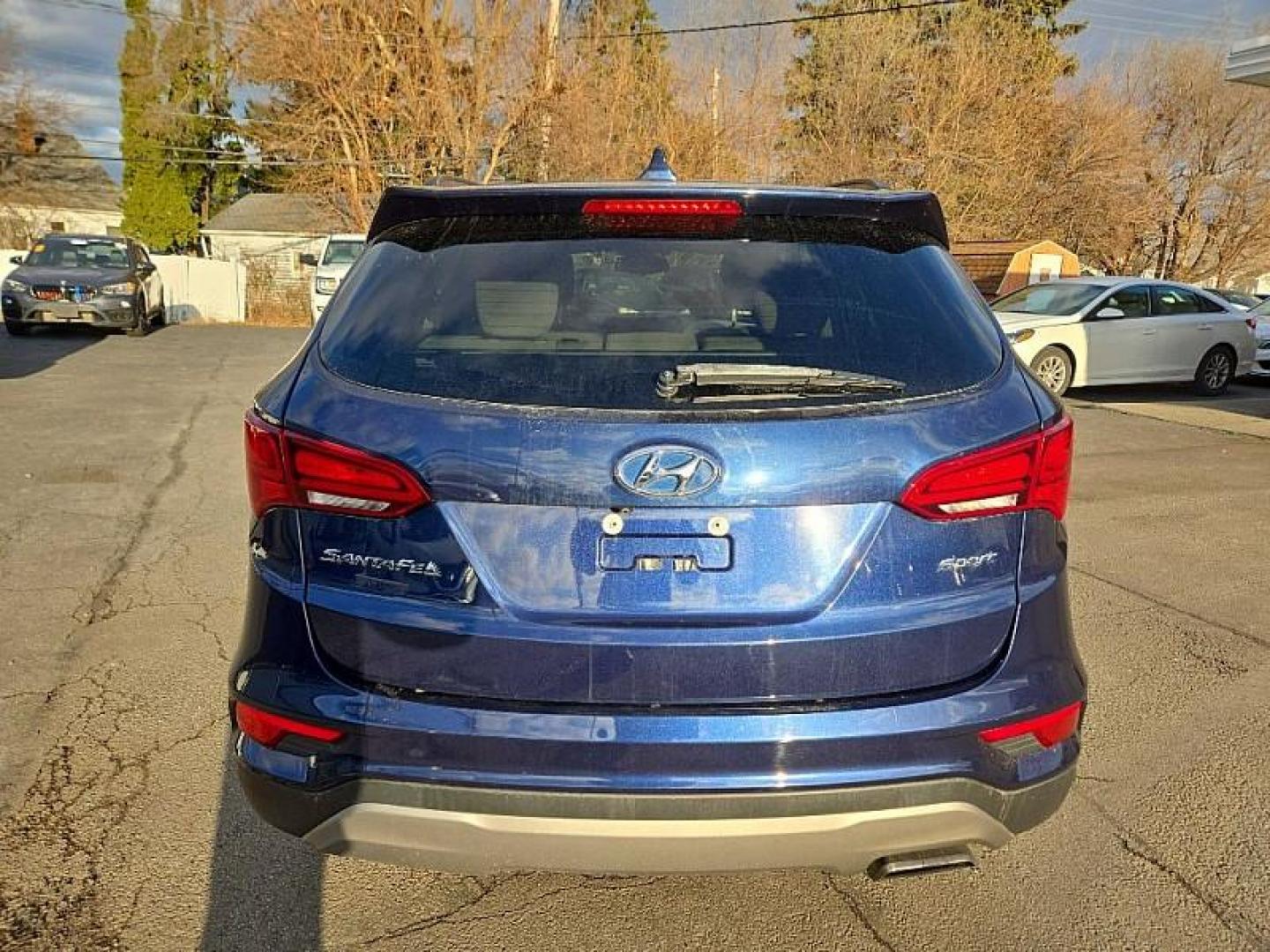 2017 BLUE /TAN/BROWN Hyundai Santa Fe Sport 2.4 FWD (5XYZU3LB3HG) with an 2.4L L4 DOHC 16V engine, 6A transmission, located at 3304 Woodville Road, Northwood, OH, 43619, (419) 210-8019, 41.612694, -83.480743 - Your #1 Destination for Auto Loans and mdash;No Matter Your Credit!At our dealership, we believe everyone deserves the opportunity to drive their dream car and mdash;whether you have good credit, bad credit, or no credit at all. With a wide selection of hundreds of cars, trucks, and SUVs, you'll fin - Photo#3