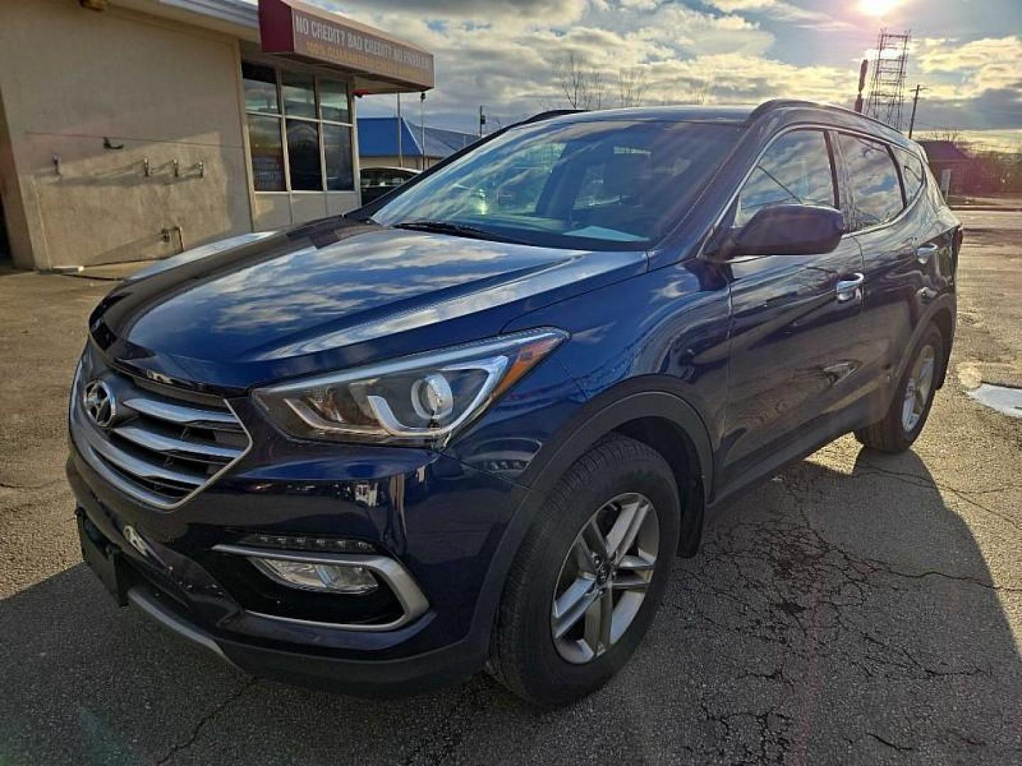 2017 BLUE /TAN/BROWN Hyundai Santa Fe Sport 2.4 FWD (5XYZU3LB3HG) with an 2.4L L4 DOHC 16V engine, 6A transmission, located at 3304 Woodville Road, Northwood, OH, 43619, (419) 210-8019, 41.612694, -83.480743 - Your #1 Destination for Auto Loans and mdash;No Matter Your Credit!At our dealership, we believe everyone deserves the opportunity to drive their dream car and mdash;whether you have good credit, bad credit, or no credit at all. With a wide selection of hundreds of cars, trucks, and SUVs, you'll fin - Photo#0