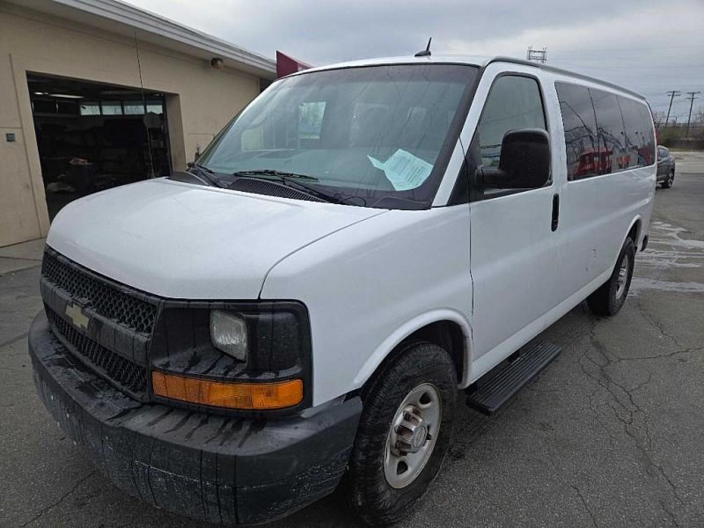 2013 WHITE /TAN Chevrolet Express LS 2500 (1GAWGPFA7D1) with an 4.8L V8 OHV 16V FFV engine, 6-Speed Automatic transmission, located at 3304 Woodville Road, Northwood, OH, 43619, (419) 210-8019, 41.612694, -83.480743 - Your #1 Destination for Auto Loans and mdash;No Matter Your Credit!At our dealership, we believe everyone deserves the opportunity to drive their dream car and mdash;whether you have good credit, bad credit, or no credit at all. With a wide selection of hundreds of cars, trucks, and SUVs, you'll fin - Photo#0