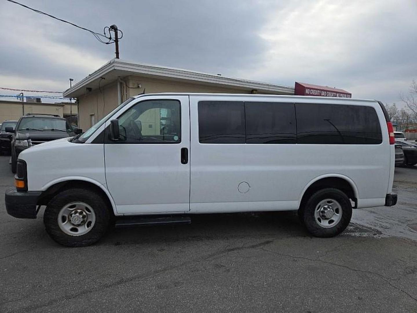 2013 WHITE /TAN Chevrolet Express LS 2500 (1GAWGPFA7D1) with an 4.8L V8 OHV 16V FFV engine, 6-Speed Automatic transmission, located at 3304 Woodville Road, Northwood, OH, 43619, (419) 210-8019, 41.612694, -83.480743 - Your #1 Destination for Auto Loans and mdash;No Matter Your Credit!At our dealership, we believe everyone deserves the opportunity to drive their dream car and mdash;whether you have good credit, bad credit, or no credit at all. With a wide selection of hundreds of cars, trucks, and SUVs, you'll fin - Photo#1