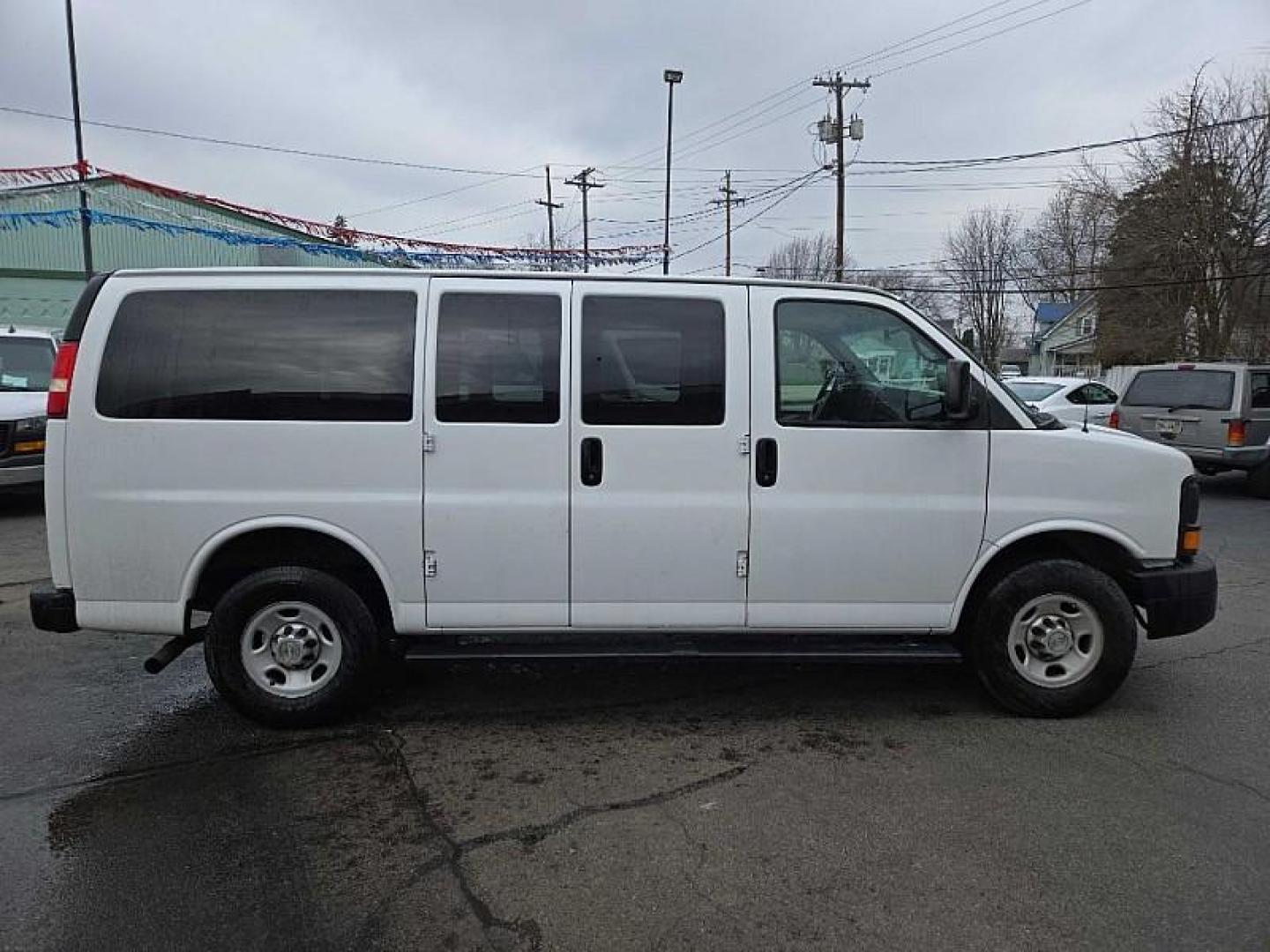 2013 WHITE /TAN Chevrolet Express LS 2500 (1GAWGPFA7D1) with an 4.8L V8 OHV 16V FFV engine, 6-Speed Automatic transmission, located at 3304 Woodville Road, Northwood, OH, 43619, (419) 210-8019, 41.612694, -83.480743 - Your #1 Destination for Auto Loans and mdash;No Matter Your Credit!At our dealership, we believe everyone deserves the opportunity to drive their dream car and mdash;whether you have good credit, bad credit, or no credit at all. With a wide selection of hundreds of cars, trucks, and SUVs, you'll fin - Photo#5