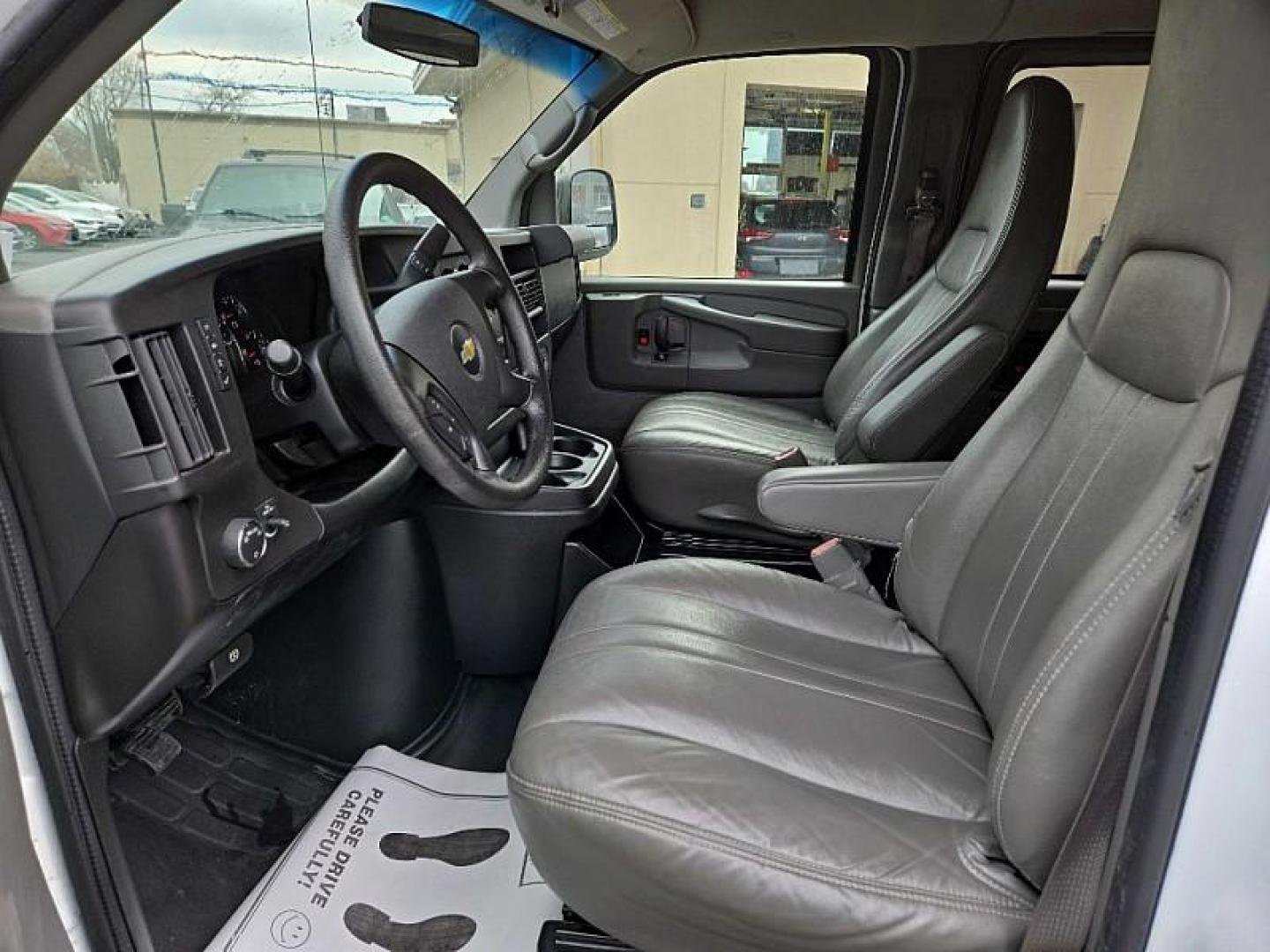 2013 WHITE /TAN Chevrolet Express LS 2500 (1GAWGPFA7D1) with an 4.8L V8 OHV 16V FFV engine, 6-Speed Automatic transmission, located at 3304 Woodville Road, Northwood, OH, 43619, (419) 210-8019, 41.612694, -83.480743 - Your #1 Destination for Auto Loans and mdash;No Matter Your Credit!At our dealership, we believe everyone deserves the opportunity to drive their dream car and mdash;whether you have good credit, bad credit, or no credit at all. With a wide selection of hundreds of cars, trucks, and SUVs, you'll fin - Photo#9