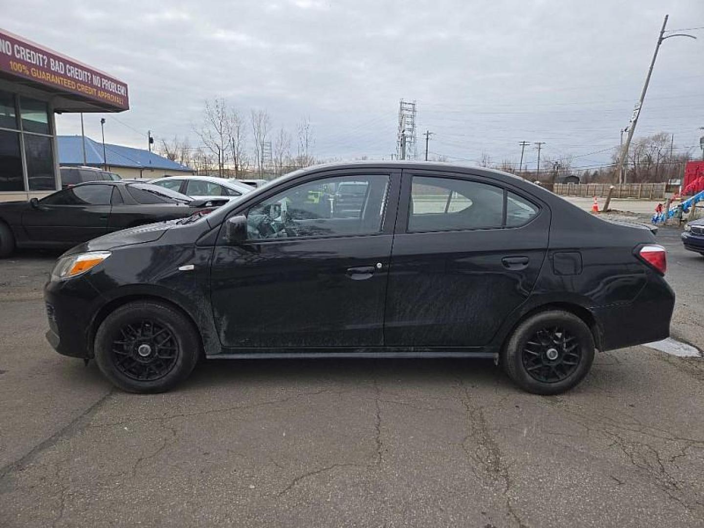 2021 BLACK /BLACK Mitsubishi Mirage G4 ES 5M (ML32FUFJ7MH) with an 1.2L L3 DOHC engine, 5M transmission, located at 3304 Woodville Road, Northwood, OH, 43619, (419) 210-8019, 41.612694, -83.480743 - Your #1 Destination for Auto Loans and mdash;No Matter Your Credit!At our dealership, we believe everyone deserves the opportunity to drive their dream car and mdash;whether you have good credit, bad credit, or no credit at all. With a wide selection of hundreds of cars, trucks, and SUVs, you'll fin - Photo#4