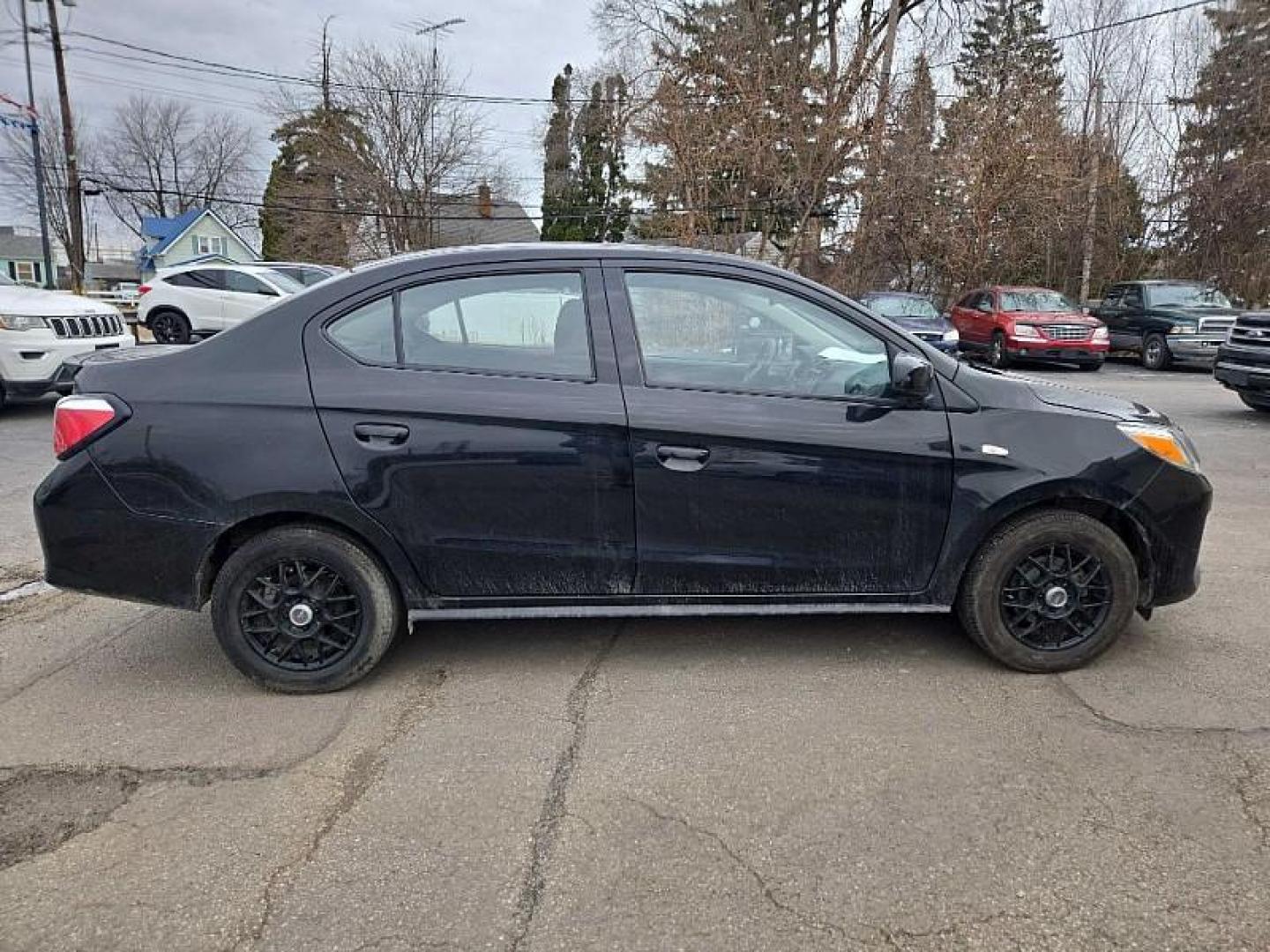 2021 BLACK /BLACK Mitsubishi Mirage G4 ES 5M (ML32FUFJ7MH) with an 1.2L L3 DOHC engine, 5M transmission, located at 3304 Woodville Road, Northwood, OH, 43619, (419) 210-8019, 41.612694, -83.480743 - Your #1 Destination for Auto Loans and mdash;No Matter Your Credit!At our dealership, we believe everyone deserves the opportunity to drive their dream car and mdash;whether you have good credit, bad credit, or no credit at all. With a wide selection of hundreds of cars, trucks, and SUVs, you'll fin - Photo#5