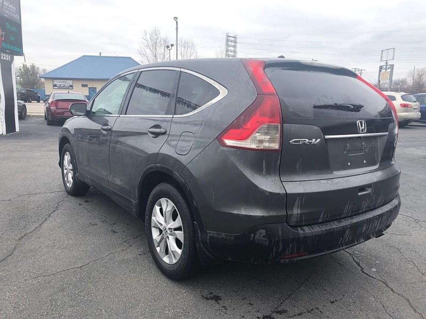 2013 GRAY /BLACK Honda CR-V EX 2WD 5-Speed AT (2HKRM3H56DH) with an 2.4L L4 DOHC 16V engine, 5-Speed Automatic transmission, located at 3304 Woodville Road, Northwood, OH, 43619, (419) 210-8019, 41.612694, -83.480743 - Your #1 Destination for Auto Loans and mdash;No Matter Your Credit!At our dealership, we believe everyone deserves the opportunity to drive their dream car and mdash;whether you have good credit, bad credit, or no credit at all. With a wide selection of hundreds of cars, trucks, and SUVs, you'll fin - Photo#2