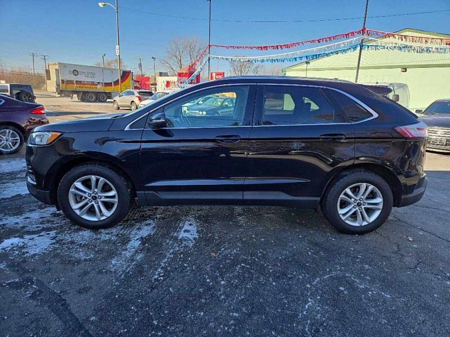 2019 BLACK /TAN Ford Edge SEL AWD (2FMPK4J94KB) with an 2.0L L4 DOHC 16V engine, 6A transmission, located at 3304 Woodville Road, Northwood, OH, 43619, (419) 210-8019, 41.612694, -83.480743 - Your #1 Destination for Auto Loans and mdash;No Matter Your Credit!At our dealership, we believe everyone deserves the opportunity to drive their dream car and mdash;whether you have good credit, bad credit, or no credit at all. With a wide selection of hundreds of cars, trucks, and SUVs, you'll fin - Photo#1