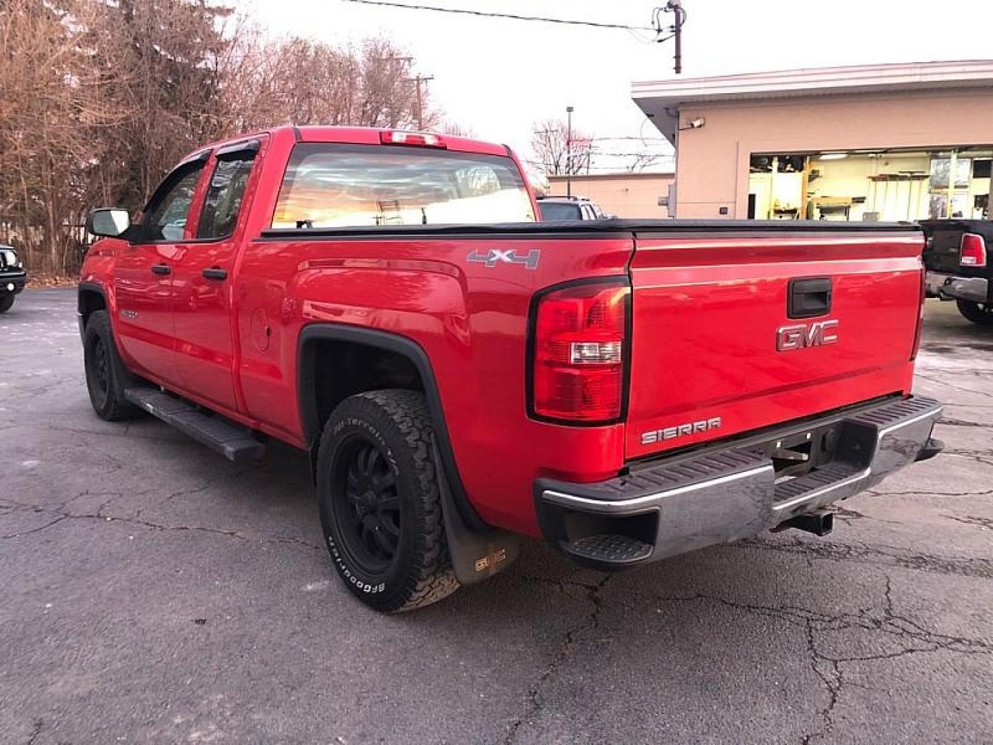 2014 Fire Red /TAN GMC Sierra 1500 Base Double Cab 4WD (1GTV2TEH6EZ) with an 4.3L V6 OHV 12V engine, 6-Speed Automatic transmission, located at 3304 Woodville Road, Northwood, OH, 43619, (419) 210-8019, 41.612694, -83.480743 - Your #1 Destination for Auto Loans and mdash;No Matter Your Credit!At our dealership, we believe everyone deserves the opportunity to drive their dream car and mdash;whether you have good credit, bad credit, or no credit at all. With a wide selection of hundreds of cars, trucks, and SUVs, you'll fin - Photo#2