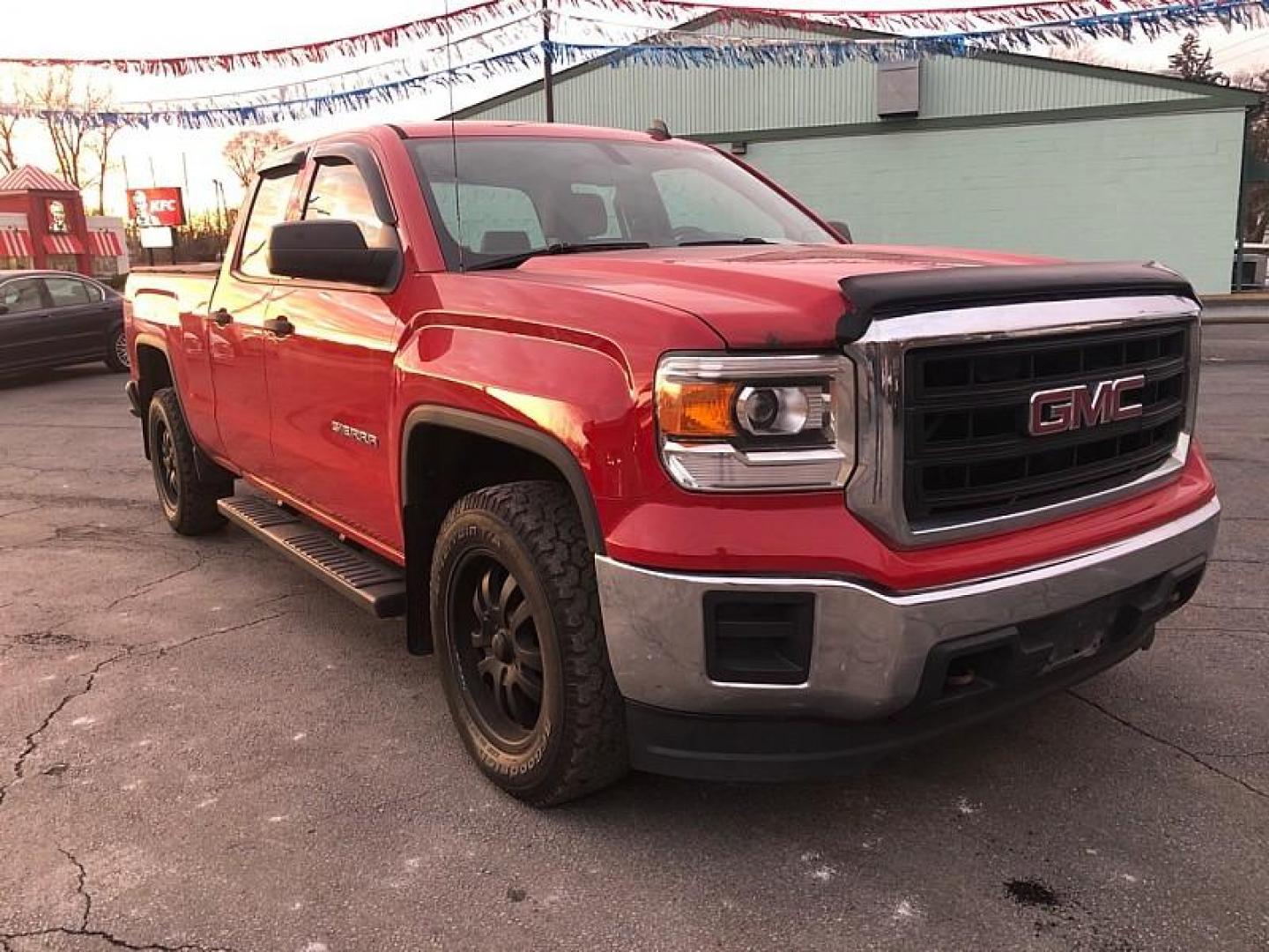 2014 Fire Red /TAN GMC Sierra 1500 Base Double Cab 4WD (1GTV2TEH6EZ) with an 4.3L V6 OHV 12V engine, 6-Speed Automatic transmission, located at 3304 Woodville Road, Northwood, OH, 43619, (419) 210-8019, 41.612694, -83.480743 - Your #1 Destination for Auto Loans and mdash;No Matter Your Credit!At our dealership, we believe everyone deserves the opportunity to drive their dream car and mdash;whether you have good credit, bad credit, or no credit at all. With a wide selection of hundreds of cars, trucks, and SUVs, you'll fin - Photo#6