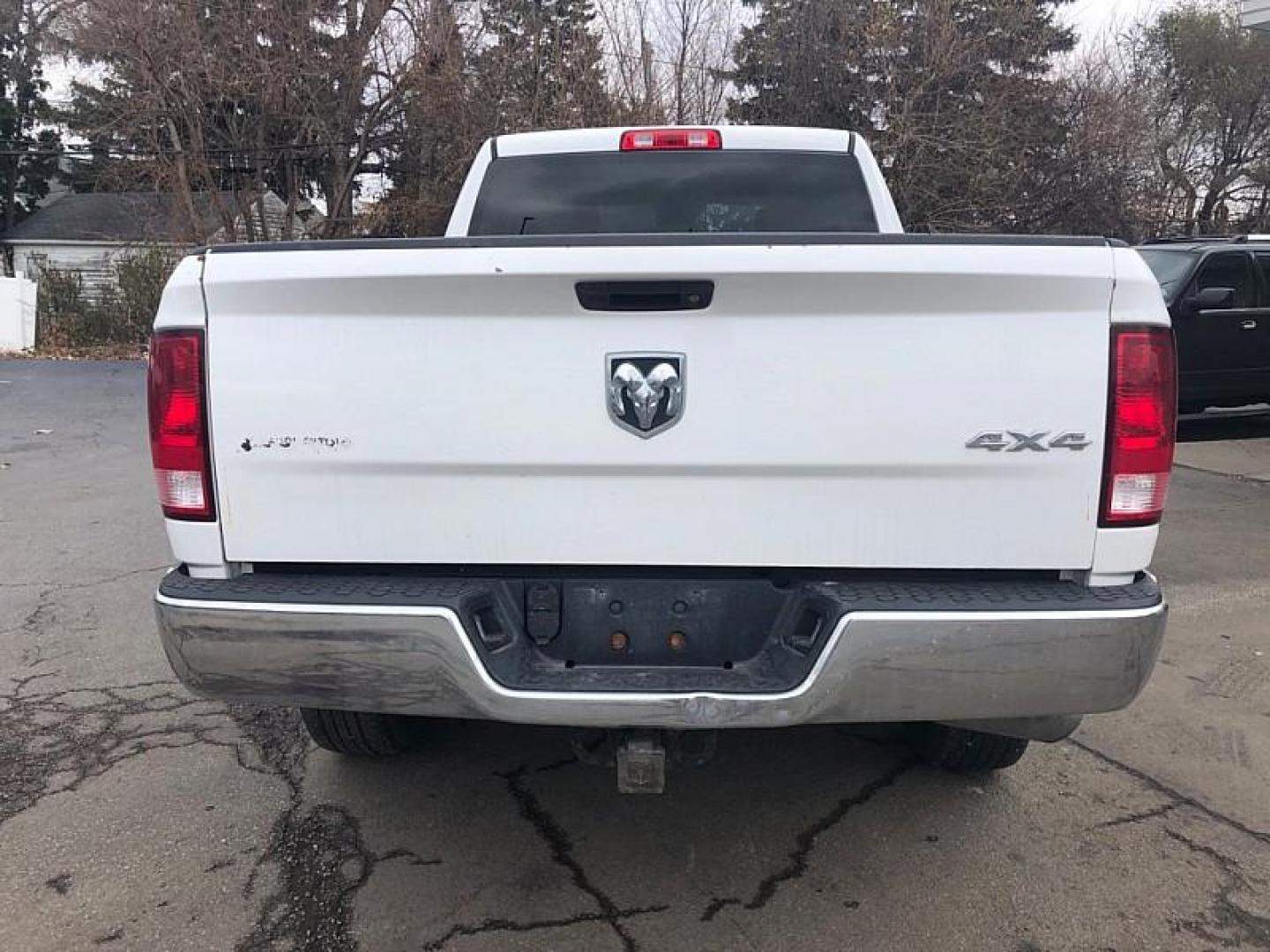 2017 WHITE /GREY RAM 1500 Tradesman Quad Cab 4WD (1C6RR7FT6HS) with an 5.7L V8 OHV 16V engine, 8A transmission, located at 3304 Woodville Road, Northwood, OH, 43619, (419) 210-8019, 41.612694, -83.480743 - Your #1 Destination for Auto Loans and mdash;No Matter Your Credit!At our dealership, we believe everyone deserves the opportunity to drive their dream car and mdash;whether you have good credit, bad credit, or no credit at all. With a wide selection of hundreds of cars, trucks, and SUVs, you'll fin - Photo#3