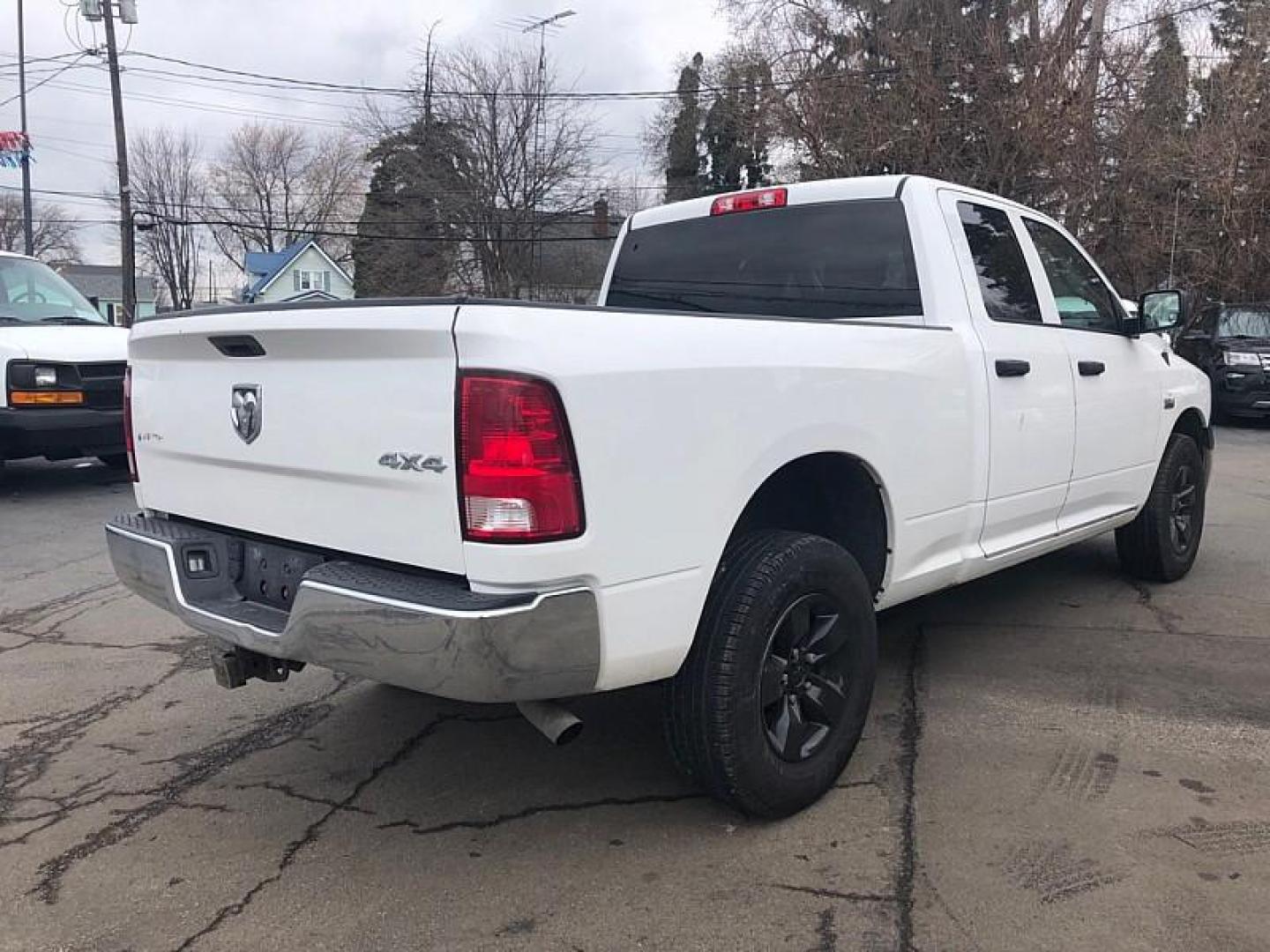 2017 WHITE /GREY RAM 1500 Tradesman Quad Cab 4WD (1C6RR7FT6HS) with an 5.7L V8 OHV 16V engine, 8A transmission, located at 3304 Woodville Road, Northwood, OH, 43619, (419) 210-8019, 41.612694, -83.480743 - Your #1 Destination for Auto Loans and mdash;No Matter Your Credit!At our dealership, we believe everyone deserves the opportunity to drive their dream car and mdash;whether you have good credit, bad credit, or no credit at all. With a wide selection of hundreds of cars, trucks, and SUVs, you'll fin - Photo#4