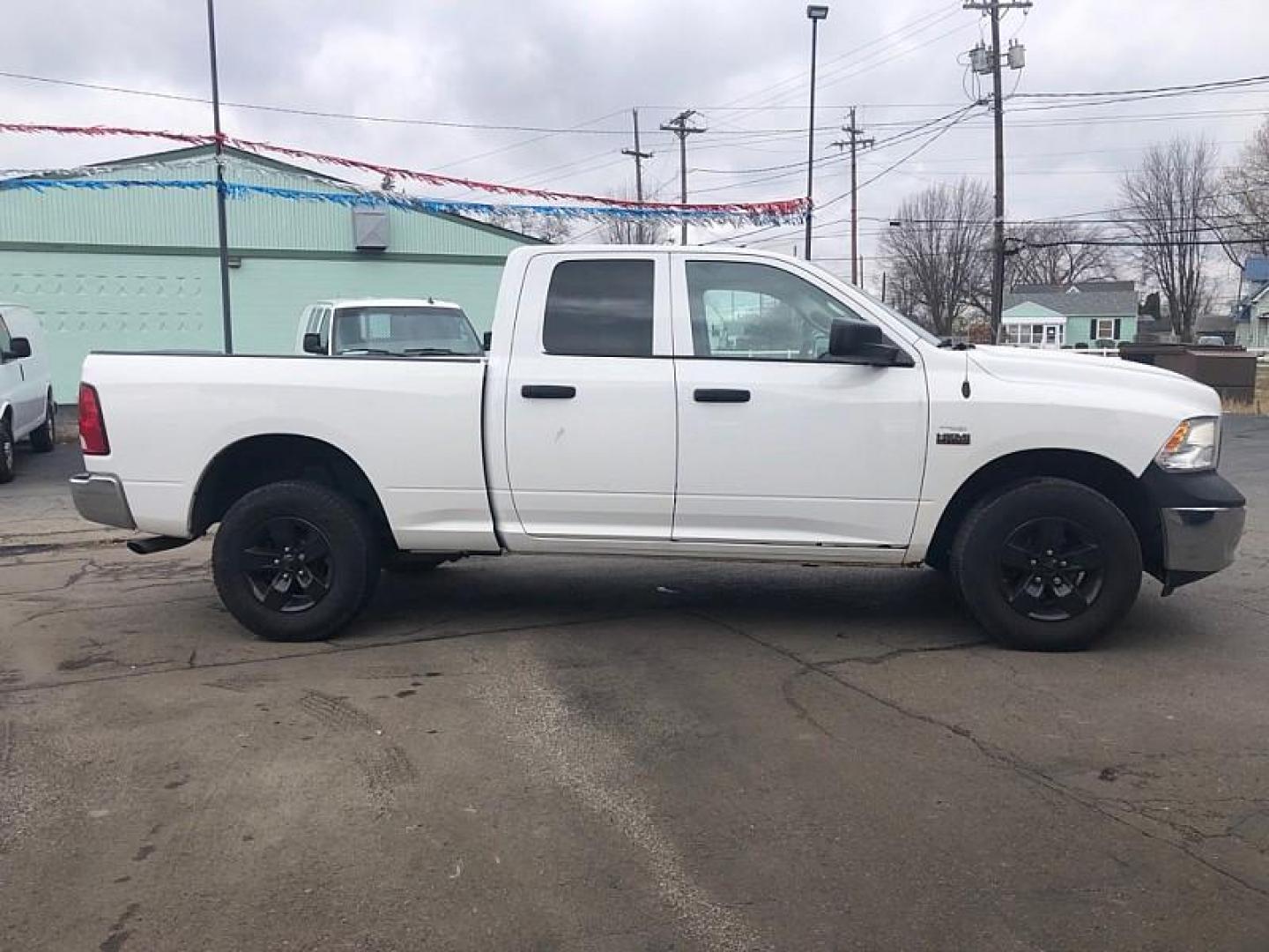 2017 WHITE /GREY RAM 1500 Tradesman Quad Cab 4WD (1C6RR7FT6HS) with an 5.7L V8 OHV 16V engine, 8A transmission, located at 3304 Woodville Road, Northwood, OH, 43619, (419) 210-8019, 41.612694, -83.480743 - Your #1 Destination for Auto Loans and mdash;No Matter Your Credit!At our dealership, we believe everyone deserves the opportunity to drive their dream car and mdash;whether you have good credit, bad credit, or no credit at all. With a wide selection of hundreds of cars, trucks, and SUVs, you'll fin - Photo#5