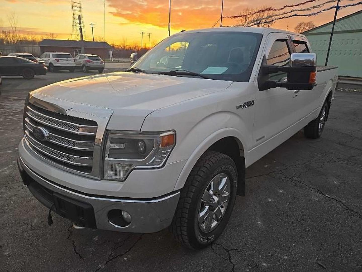 2014 WHITE /BLACK Ford F-150 FX4 SuperCrew 5.5-ft. Bed 4WD (1FTFW1ET1EF) with an 3.5L V6 TURBO engine, 6-Speed Automatic transmission, located at 3304 Woodville Road, Northwood, OH, 43619, (419) 210-8019, 41.612694, -83.480743 - Your #1 Destination for Auto Loans and mdash;No Matter Your Credit!At our dealership, we believe everyone deserves the opportunity to drive their dream car and mdash;whether you have good credit, bad credit, or no credit at all. With a wide selection of hundreds of cars, trucks, and SUVs, you'll fin - Photo#0