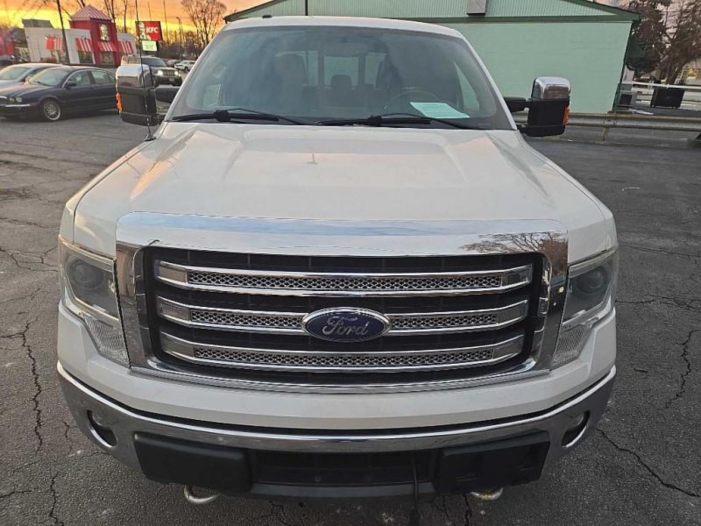 2014 WHITE /BLACK Ford F-150 FX4 SuperCrew 5.5-ft. Bed 4WD (1FTFW1ET1EF) with an 3.5L V6 TURBO engine, 6-Speed Automatic transmission, located at 3304 Woodville Road, Northwood, OH, 43619, (419) 210-8019, 41.612694, -83.480743 - Your #1 Destination for Auto Loans and mdash;No Matter Your Credit!At our dealership, we believe everyone deserves the opportunity to drive their dream car and mdash;whether you have good credit, bad credit, or no credit at all. With a wide selection of hundreds of cars, trucks, and SUVs, you'll fin - Photo#11