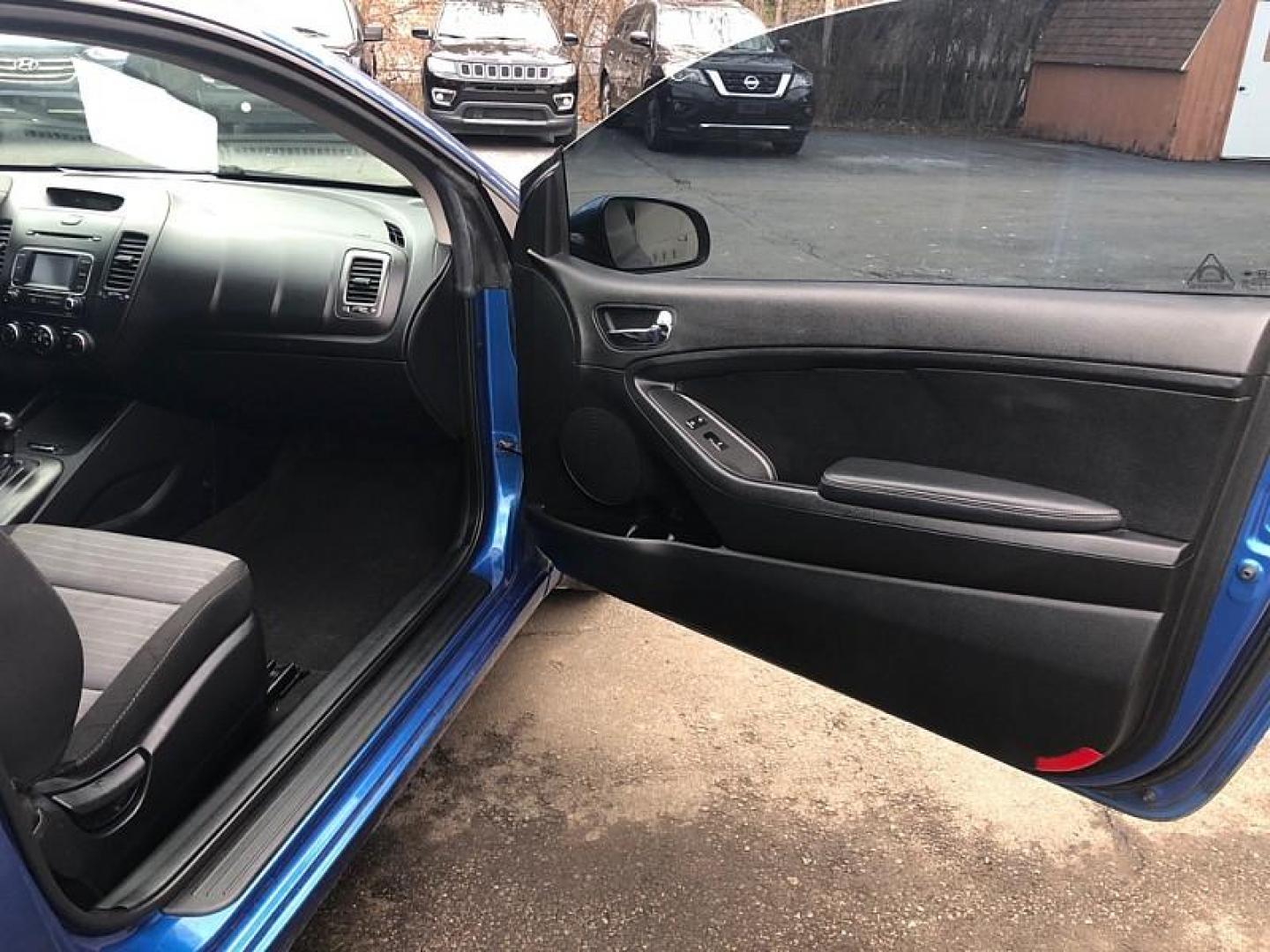 2014 BLUE /BLACK Kia Forte Koup EX (KNAFX6A89E5) with an 2.0L L4 DOHC 16V engine, 6-Speed Automatic transmission, located at 3304 Woodville Road, Northwood, OH, 43619, (419) 210-8019, 41.612694, -83.480743 - Your #1 Destination for Auto Loans and mdash;No Matter Your Credit!At our dealership, we believe everyone deserves the opportunity to drive their dream car and mdash;whether you have good credit, bad credit, or no credit at all. With a wide selection of hundreds of cars, trucks, and SUVs, you'll fin - Photo#12