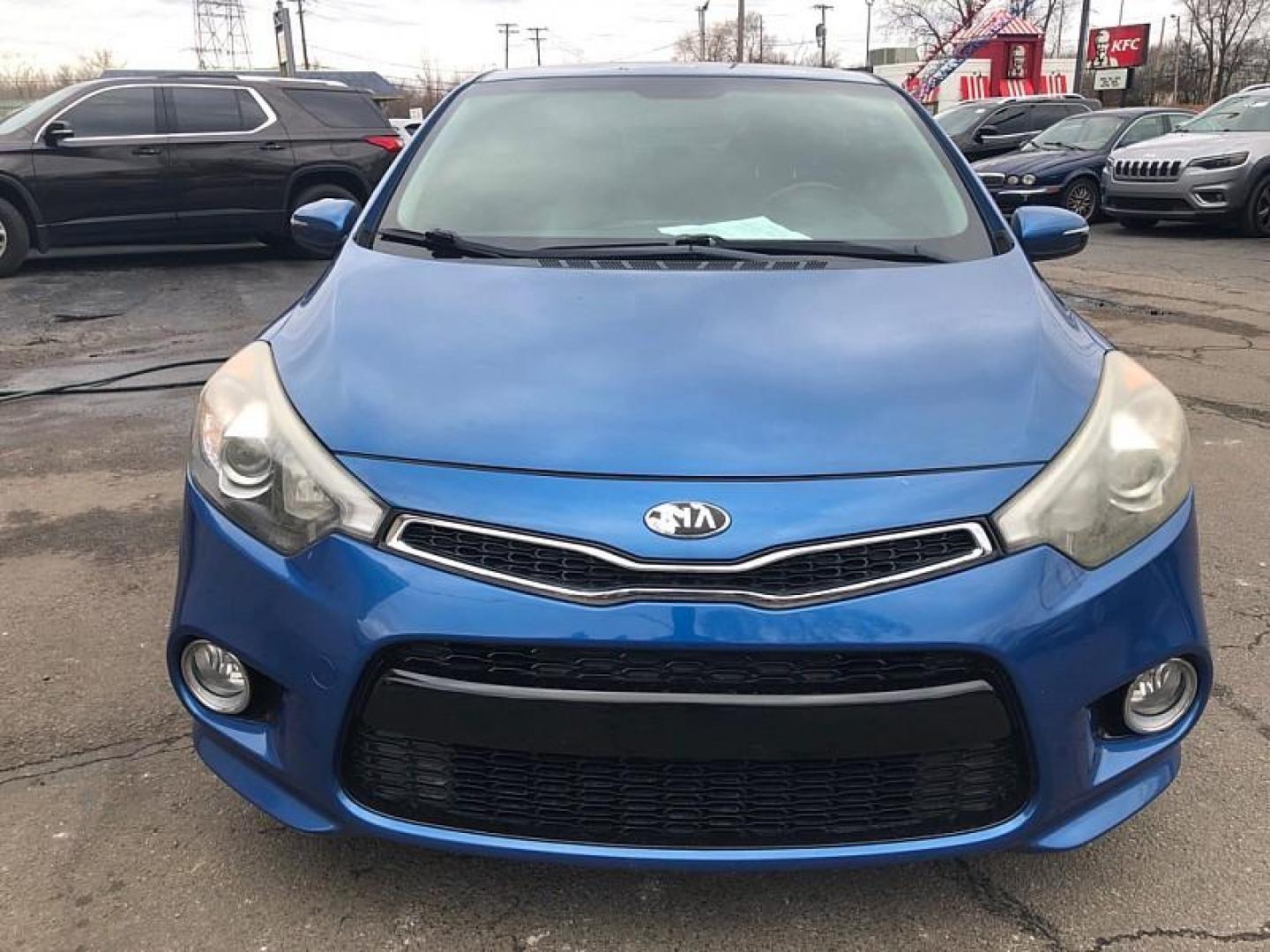 2014 BLUE /BLACK Kia Forte Koup EX (KNAFX6A89E5) with an 2.0L L4 DOHC 16V engine, 6-Speed Automatic transmission, located at 3304 Woodville Road, Northwood, OH, 43619, (419) 210-8019, 41.612694, -83.480743 - Your #1 Destination for Auto Loans and mdash;No Matter Your Credit!At our dealership, we believe everyone deserves the opportunity to drive their dream car and mdash;whether you have good credit, bad credit, or no credit at all. With a wide selection of hundreds of cars, trucks, and SUVs, you'll fin - Photo#7