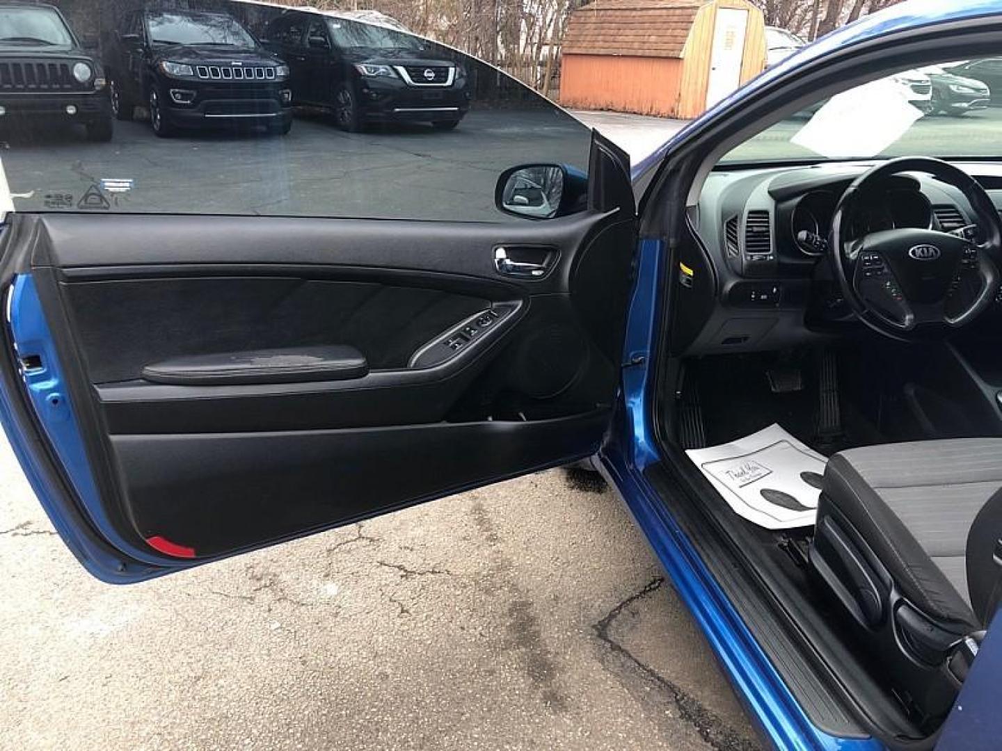 2014 BLUE /BLACK Kia Forte Koup EX (KNAFX6A89E5) with an 2.0L L4 DOHC 16V engine, 6-Speed Automatic transmission, located at 3304 Woodville Road, Northwood, OH, 43619, (419) 210-8019, 41.612694, -83.480743 - Your #1 Destination for Auto Loans and mdash;No Matter Your Credit!At our dealership, we believe everyone deserves the opportunity to drive their dream car and mdash;whether you have good credit, bad credit, or no credit at all. With a wide selection of hundreds of cars, trucks, and SUVs, you'll fin - Photo#8