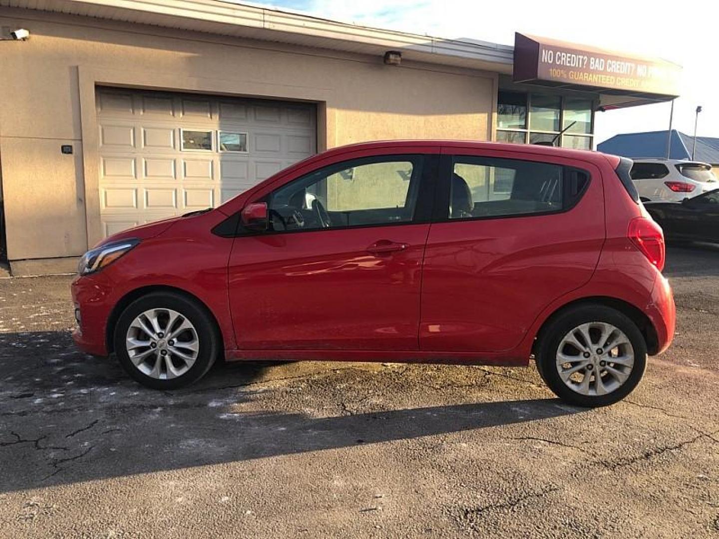 2021 RED /BLACK Chevrolet Spark 1LT CVT (KL8CD6SA1MC) with an 1.4L L4 16V DOHC engine, CVT transmission, located at 3304 Woodville Road, Northwood, OH, 43619, (419) 210-8019, 41.612694, -83.480743 - Your #1 Destination for Auto Loans and mdash;No Matter Your Credit!At our dealership, we believe everyone deserves the opportunity to drive their dream car and mdash;whether you have good credit, bad credit, or no credit at all. With a wide selection of hundreds of cars, trucks, and SUVs, you'll fin - Photo#1