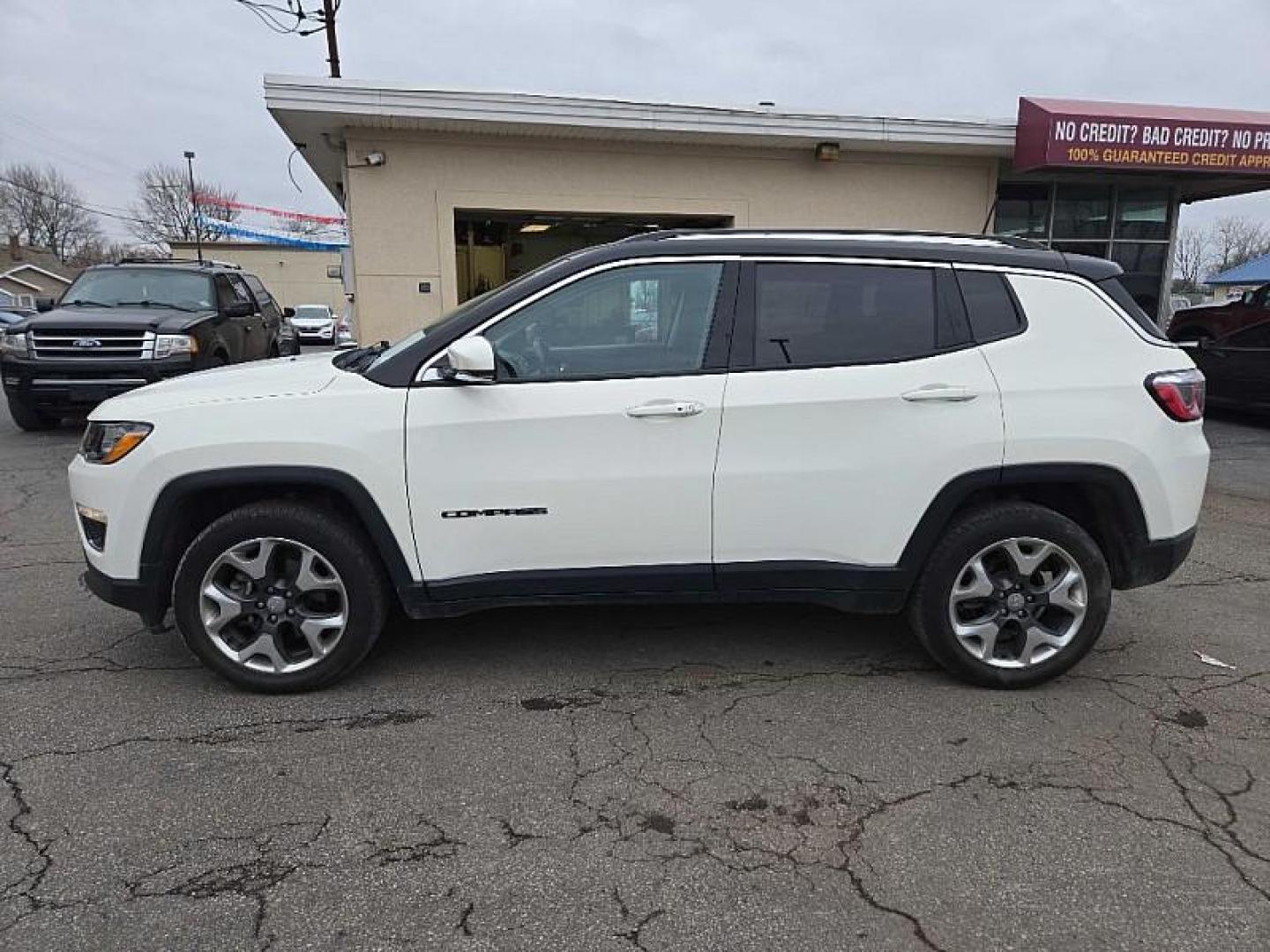 2019 WHITE /BLACK Jeep Compass Limited 4WD (3C4NJDCB6KT) with an 2.4L L4 DOHC 16V engine, CVT transmission, located at 3304 Woodville Road, Northwood, OH, 43619, (419) 210-8019, 41.612694, -83.480743 - Photo#26