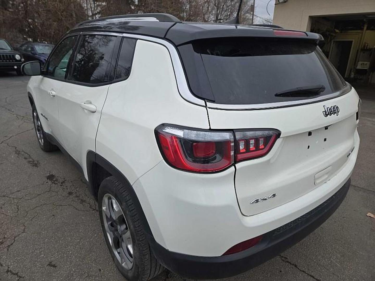 2019 WHITE /BLACK Jeep Compass Limited 4WD (3C4NJDCB6KT) with an 2.4L L4 DOHC 16V engine, CVT transmission, located at 3304 Woodville Road, Northwood, OH, 43619, (419) 210-8019, 41.612694, -83.480743 - Photo#2