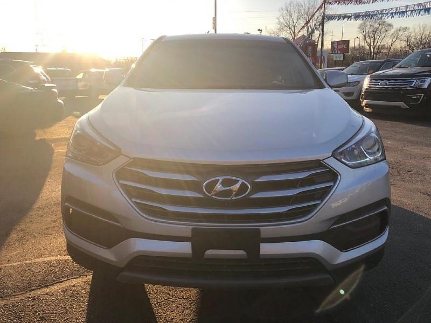 2018 SILVER /TAN Hyundai Santa Fe Sport 2.4 AWD (5XYZTDLB4JG) with an 2.4L L4 DOHC 16V engine, 6A transmission, located at 3304 Woodville Road, Northwood, OH, 43619, (419) 210-8019, 41.612694, -83.480743 - Your #1 Destination for Auto Loans and mdash;No Matter Your Credit!At our dealership, we believe everyone deserves the opportunity to drive their dream car and mdash;whether you have good credit, bad credit, or no credit at all. With a wide selection of hundreds of cars, trucks, and SUVs, you'll fin - Photo#7