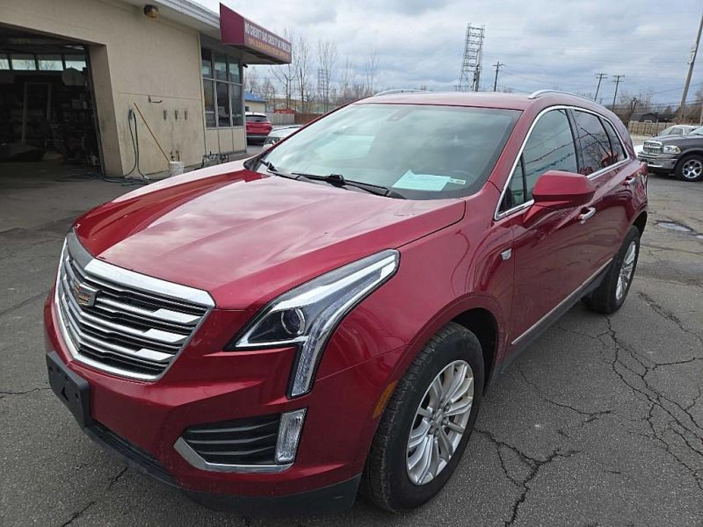 2019 RED /TAN Cadillac XT5 Base (1GYKNARS1KZ) with an 3.6L V6 DOHC 24V engine, 8A transmission, located at 3304 Woodville Road, Northwood, OH, 43619, (419) 210-8019, 41.612694, -83.480743 - Your #1 Destination for Auto Loans and mdash;No Matter Your Credit!At our dealership, we believe everyone deserves the opportunity to drive their dream car and mdash;whether you have good credit, bad credit, or no credit at all. With a wide selection of hundreds of cars, trucks, and SUVs, you'll fin - Photo#0