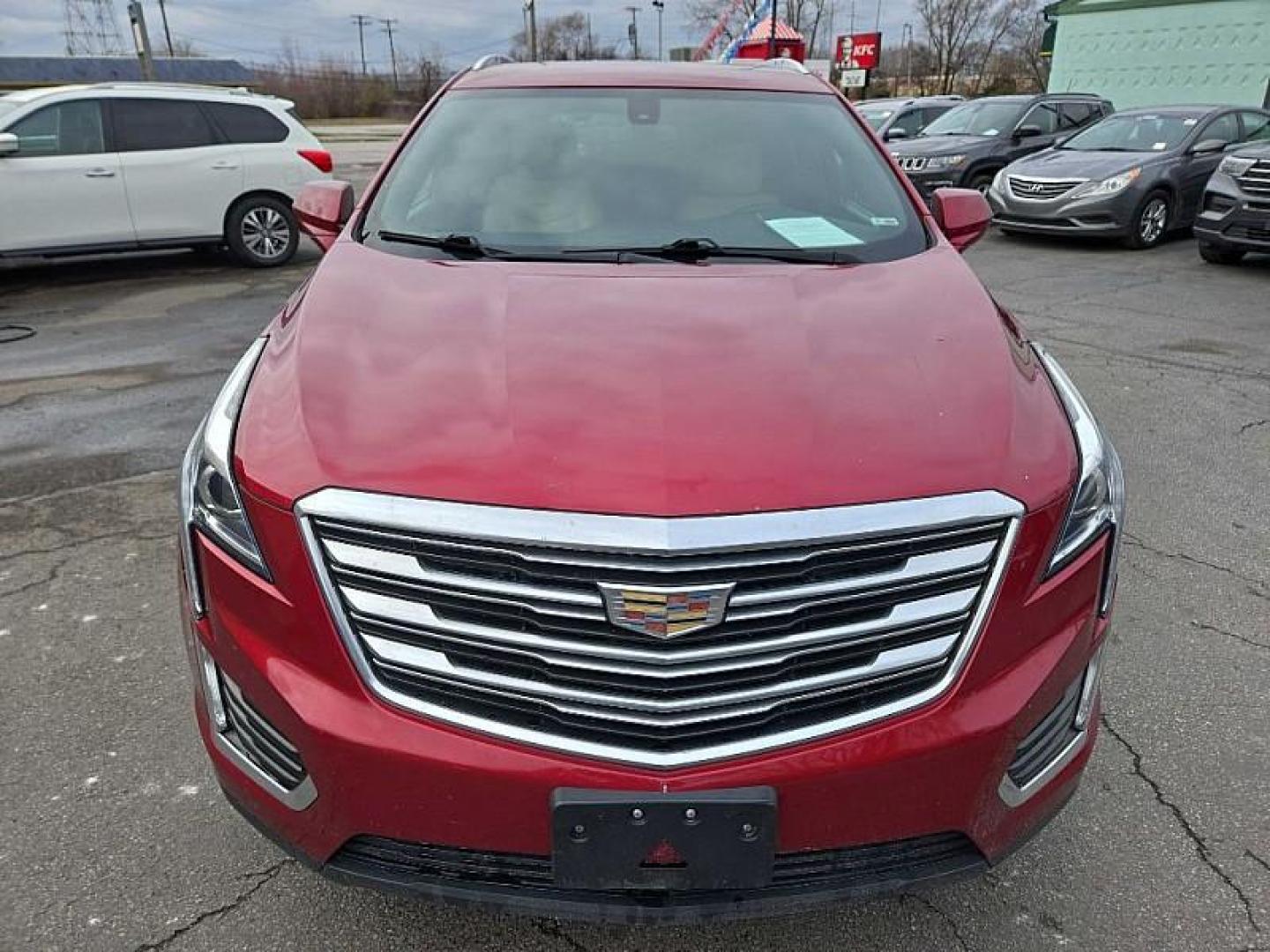 2019 RED /TAN Cadillac XT5 Base (1GYKNARS1KZ) with an 3.6L V6 DOHC 24V engine, 8A transmission, located at 3304 Woodville Road, Northwood, OH, 43619, (419) 210-8019, 41.612694, -83.480743 - Your #1 Destination for Auto Loans and mdash;No Matter Your Credit!At our dealership, we believe everyone deserves the opportunity to drive their dream car and mdash;whether you have good credit, bad credit, or no credit at all. With a wide selection of hundreds of cars, trucks, and SUVs, you'll fin - Photo#7