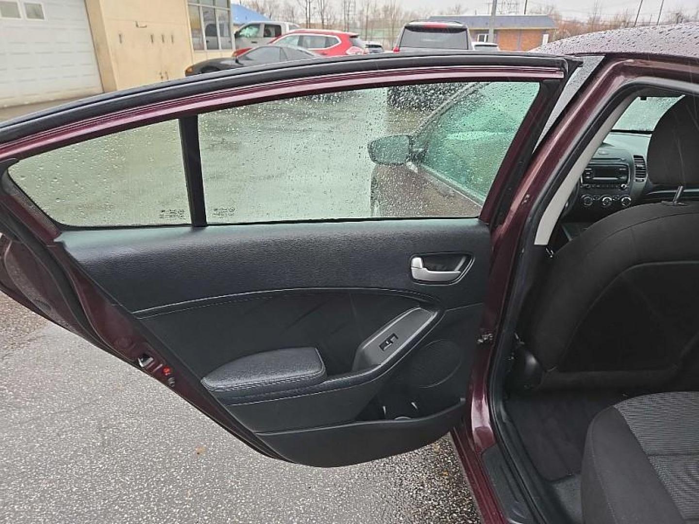 2018 RED /BLACK Kia Forte LX 6M (3KPFK4A76JE) with an 2.0L L4 DOHC 16V engine, 6M transmission, located at 3304 Woodville Road, Northwood, OH, 43619, (419) 210-8019, 41.612694, -83.480743 - Your #1 Destination for Auto Loans and mdash;No Matter Your Credit!At our dealership, we believe everyone deserves the opportunity to drive their dream car and mdash;whether you have good credit, bad credit, or no credit at all. With a wide selection of hundreds of cars, trucks, and SUVs, you'll fin - Photo#10