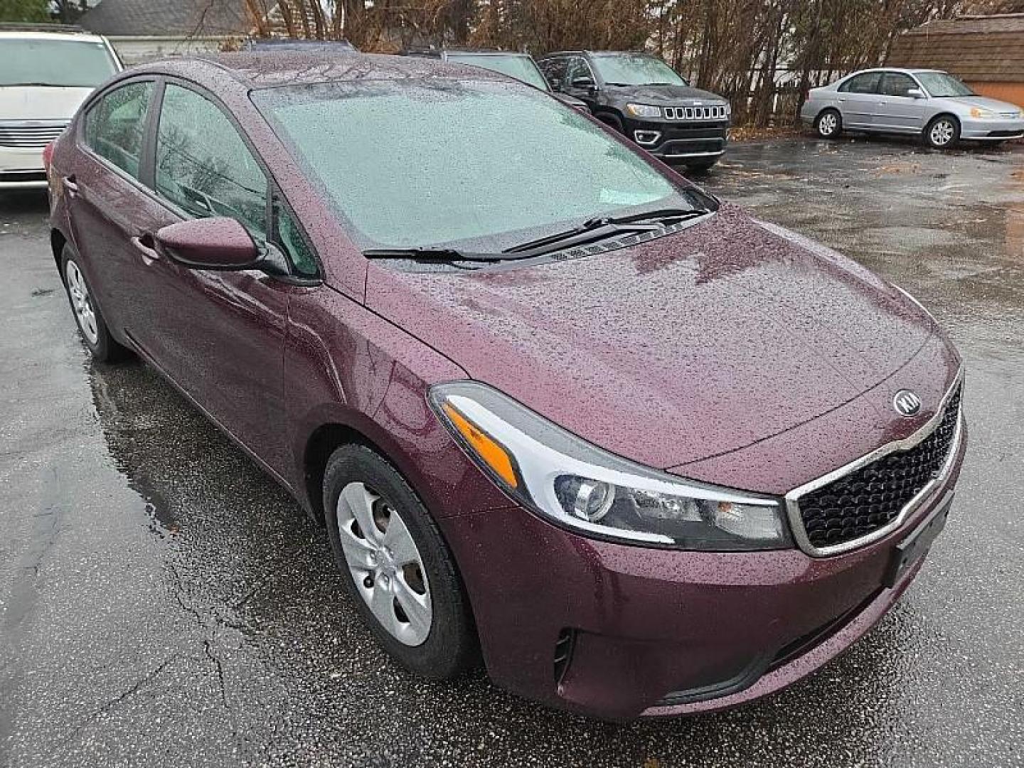 2018 RED /BLACK Kia Forte LX 6M (3KPFK4A76JE) with an 2.0L L4 DOHC 16V engine, 6M transmission, located at 3304 Woodville Road, Northwood, OH, 43619, (419) 210-8019, 41.612694, -83.480743 - Your #1 Destination for Auto Loans and mdash;No Matter Your Credit!At our dealership, we believe everyone deserves the opportunity to drive their dream car and mdash;whether you have good credit, bad credit, or no credit at all. With a wide selection of hundreds of cars, trucks, and SUVs, you'll fin - Photo#6