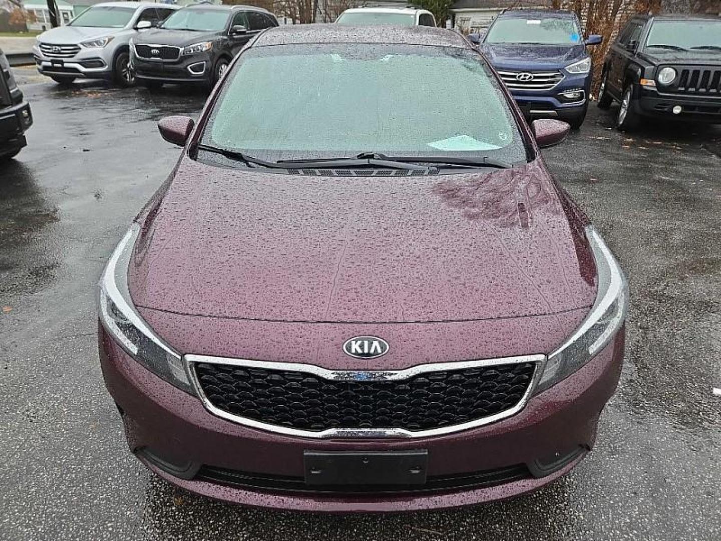 2018 RED /BLACK Kia Forte LX 6M (3KPFK4A76JE) with an 2.0L L4 DOHC 16V engine, 6M transmission, located at 3304 Woodville Road, Northwood, OH, 43619, (419) 210-8019, 41.612694, -83.480743 - Your #1 Destination for Auto Loans and mdash;No Matter Your Credit!At our dealership, we believe everyone deserves the opportunity to drive their dream car and mdash;whether you have good credit, bad credit, or no credit at all. With a wide selection of hundreds of cars, trucks, and SUVs, you'll fin - Photo#7