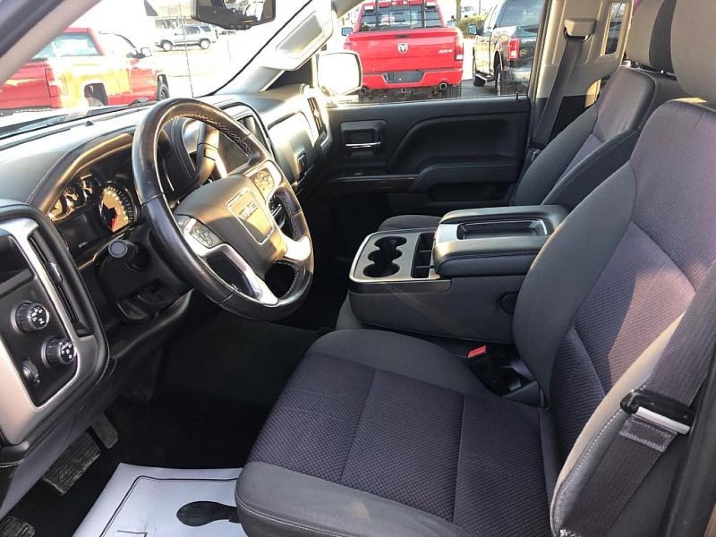 2013 TAN /BLACK GMC Sierra 1500 SLE Ext. Cab 4WD (1GTV2UEC9EZ) with an 5.3L V8 OHV 16V engine, 6-Speed Automatic transmission, located at 3304 Woodville Road, Northwood, OH, 43619, (419) 210-8019, 41.612694, -83.480743 - Your #1 Destination for Auto Loans and mdash;No Matter Your Credit!At our dealership, we believe everyone deserves the opportunity to drive their dream car and mdash;whether you have good credit, bad credit, or no credit at all. With a wide selection of hundreds of cars, trucks, and SUVs, you'll fin - Photo#9